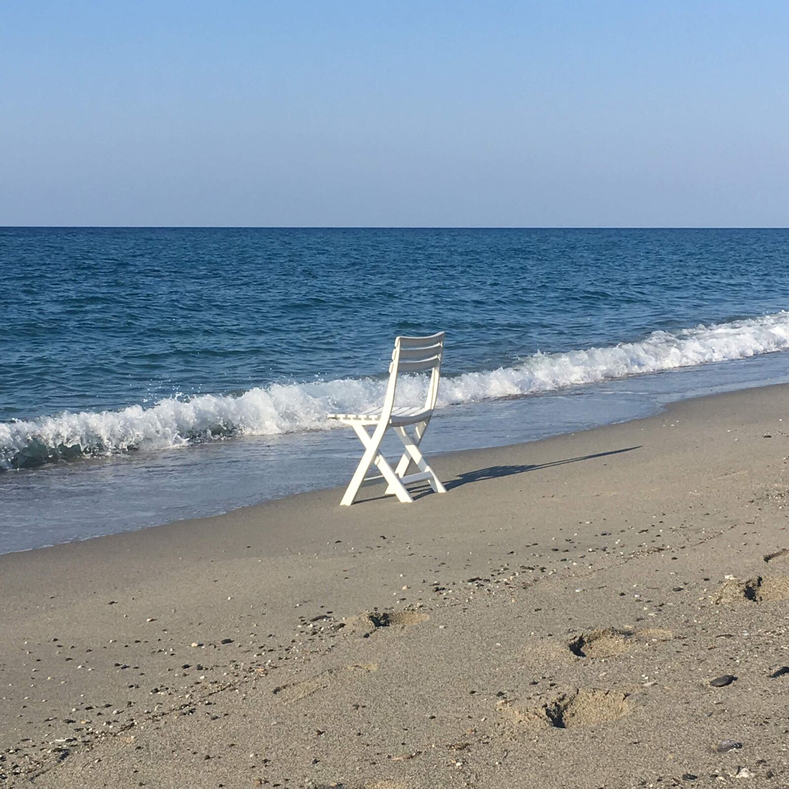Apple iPhone 6s sample photo. Beach, chair, sea photography