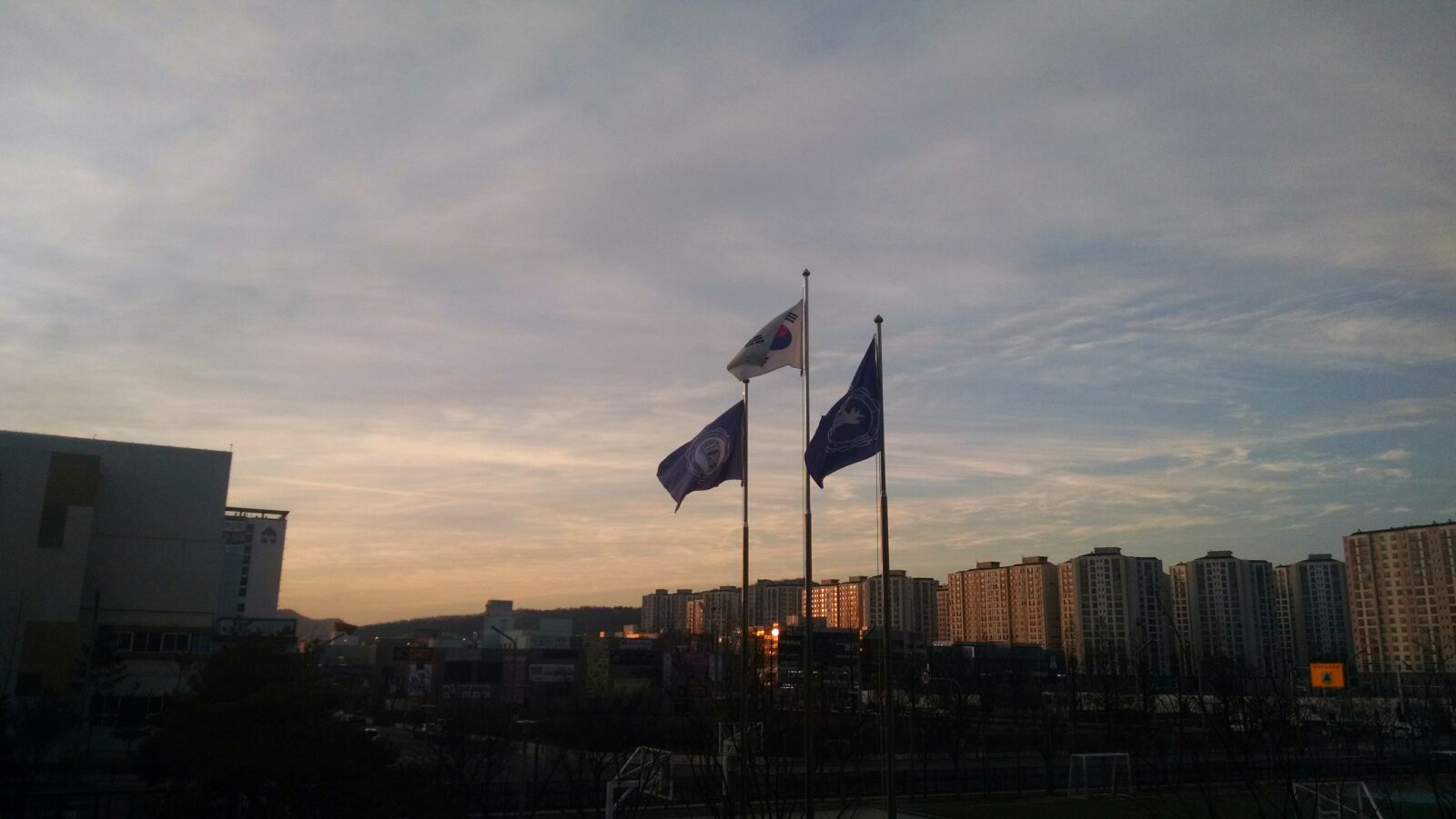 QCOM-AA QCAM-AA sample photo. City, flag, flags photography