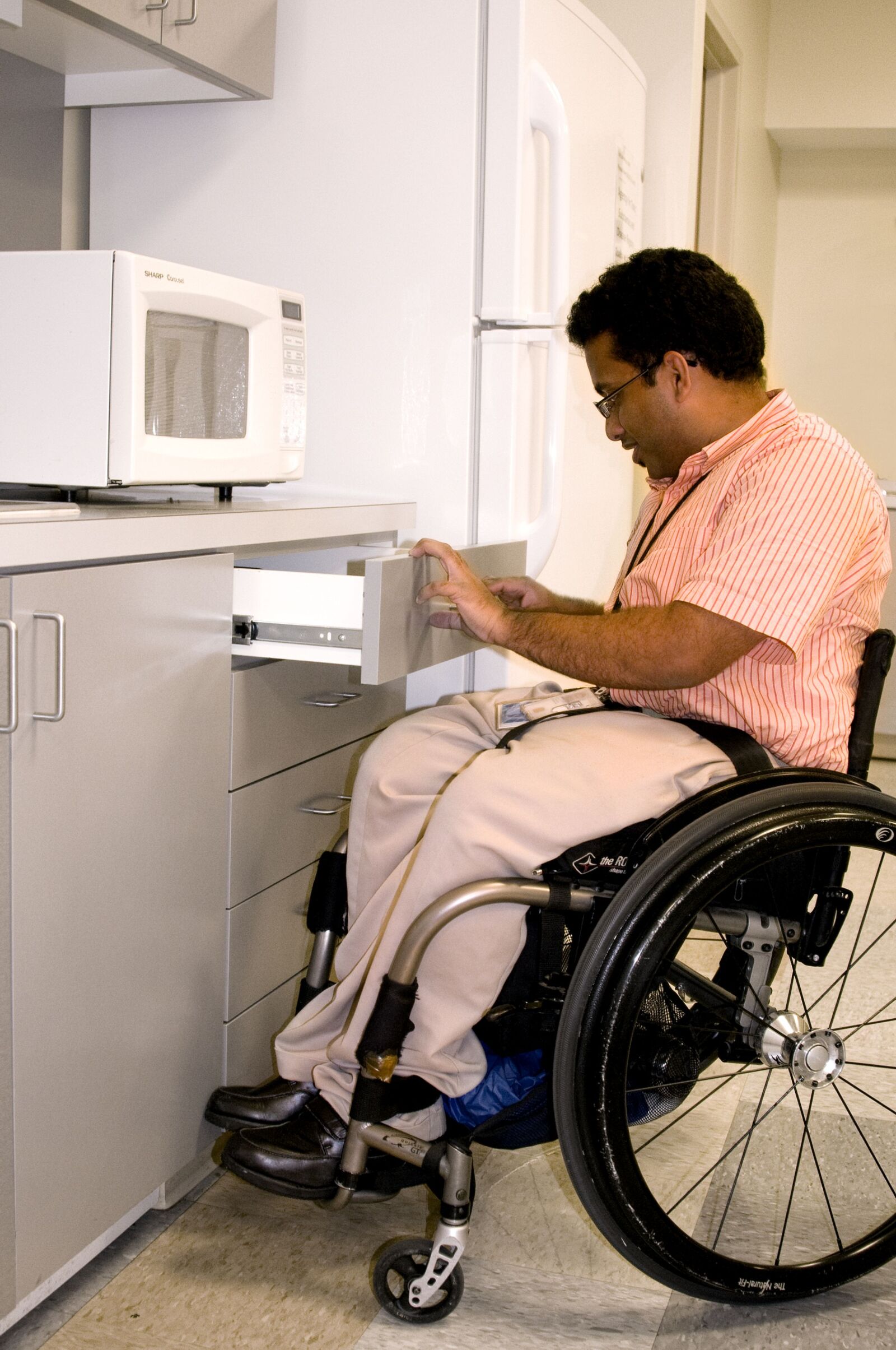 Nikon D300 sample photo. Man, wheelchair, kitchen, setting photography