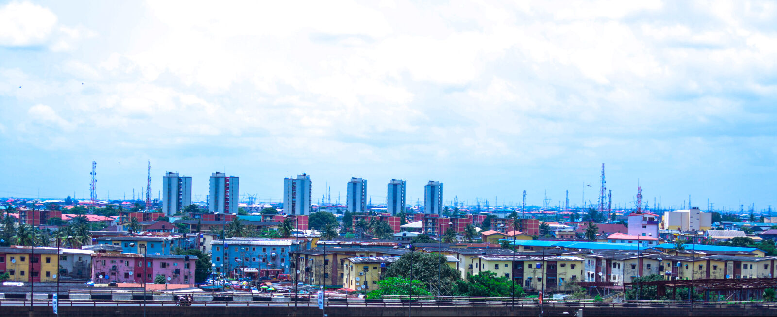 Canon EF 70-200mm F2.8L USM sample photo. Apartment, buildings, blue, sky photography
