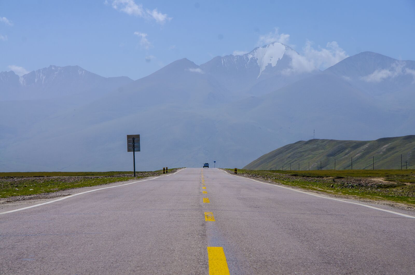 Nikon D7000 sample photo. Road, mountain, grassland photography