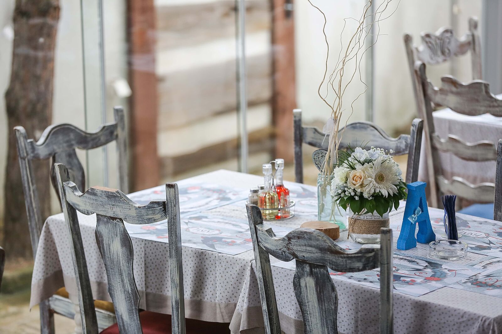 Canon EF 70-200mm F2.8L IS II USM sample photo. Chair, table, vase, interior photography