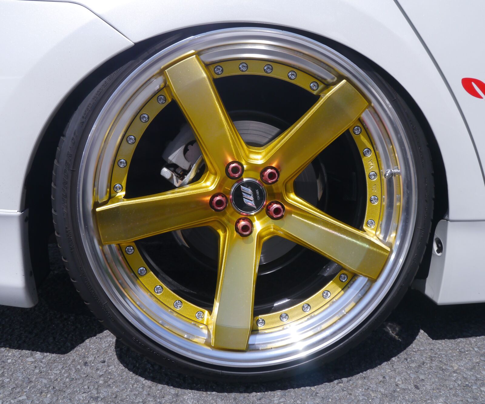 Panasonic Lumix DMC-GX1 sample photo. Toyota vehicles, hybrid, wheel photography