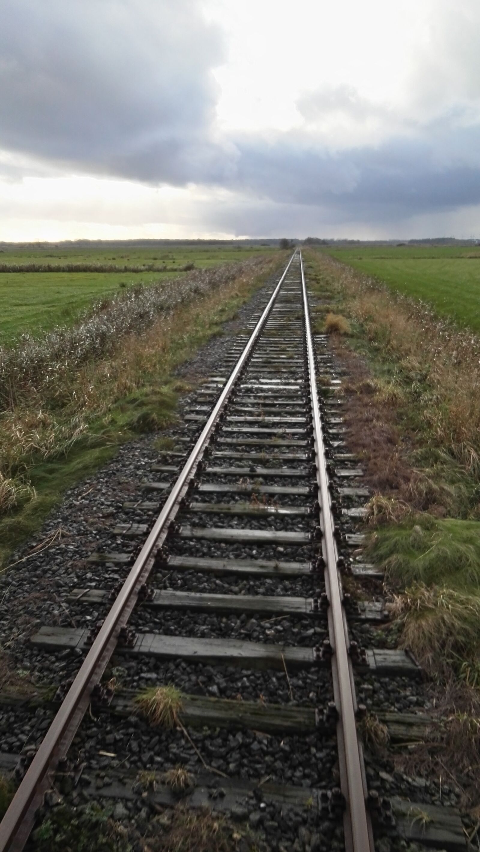 HUAWEI GRA-L09 sample photo. Railroad track, clouds, sky photography