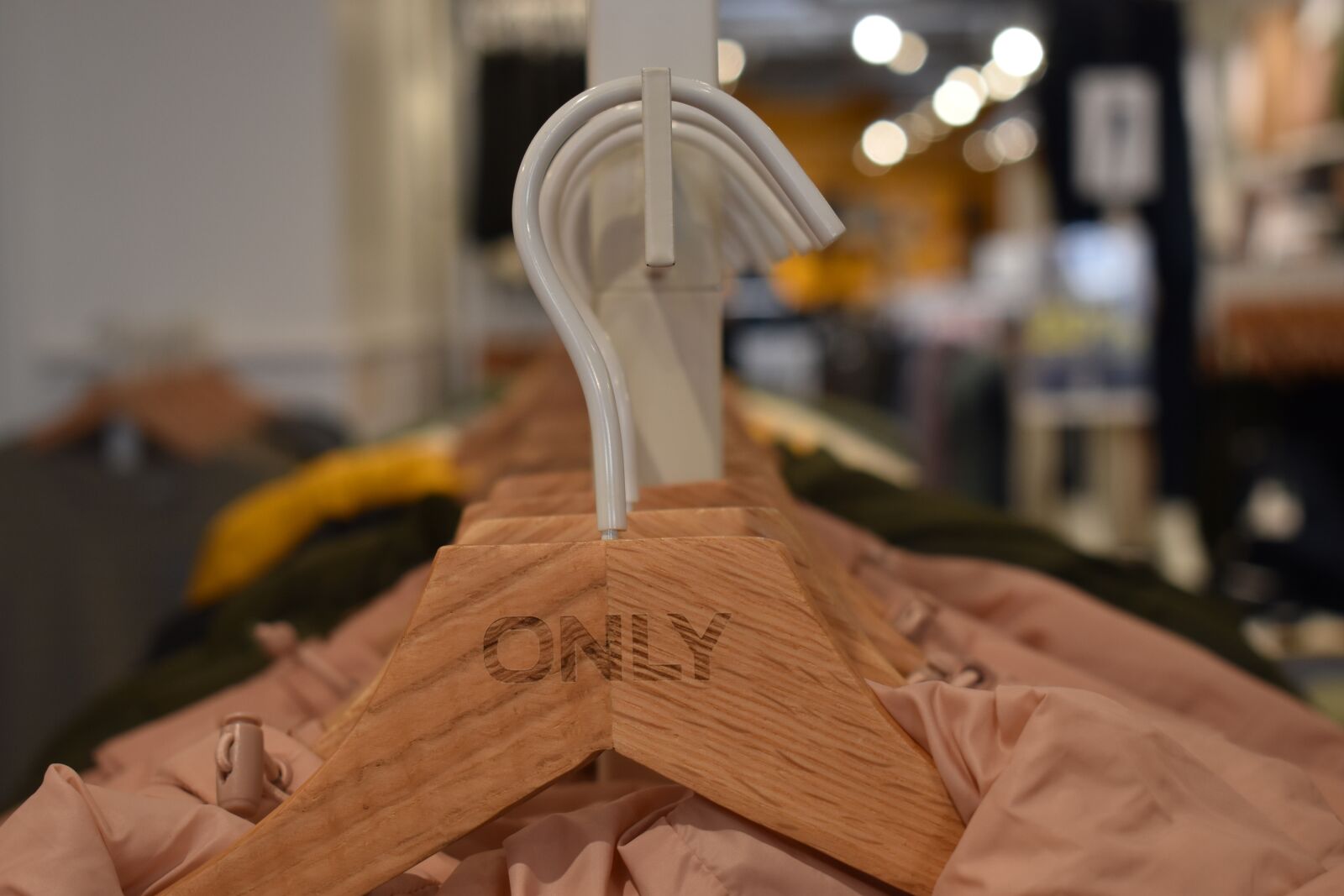 Nikon D3500 sample photo. Shop, coat hanger, order photography