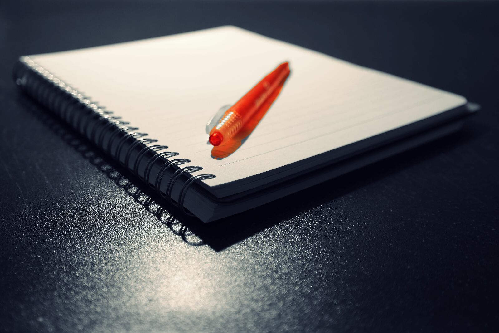 Samsung NX300 sample photo. Books, pencil, red photography