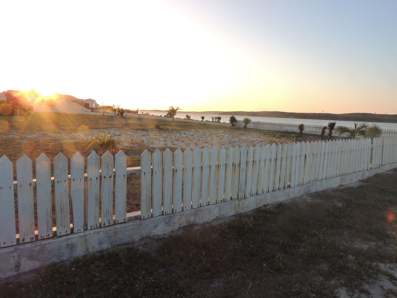 Nikon Coolpix P510 sample photo. Evening, sun, fence, fences photography