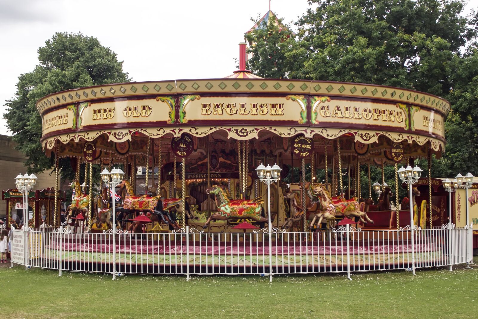 Olympus OM-D E-M10 sample photo. Carousel, carousel horses, wooden photography