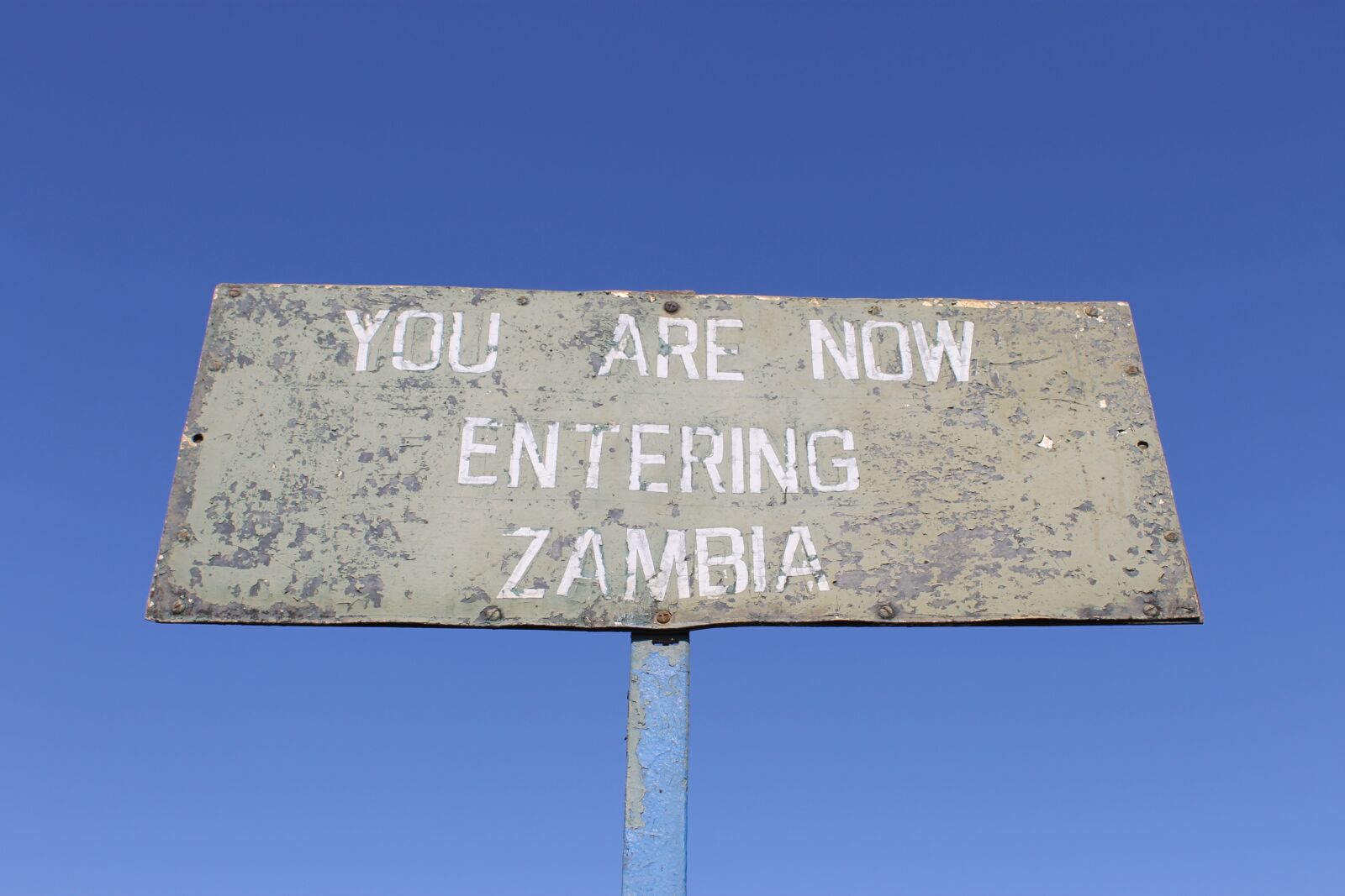 Canon EOS 1100D (EOS Rebel T3 / EOS Kiss X50) sample photo. Zambia, roadsign, africa photography