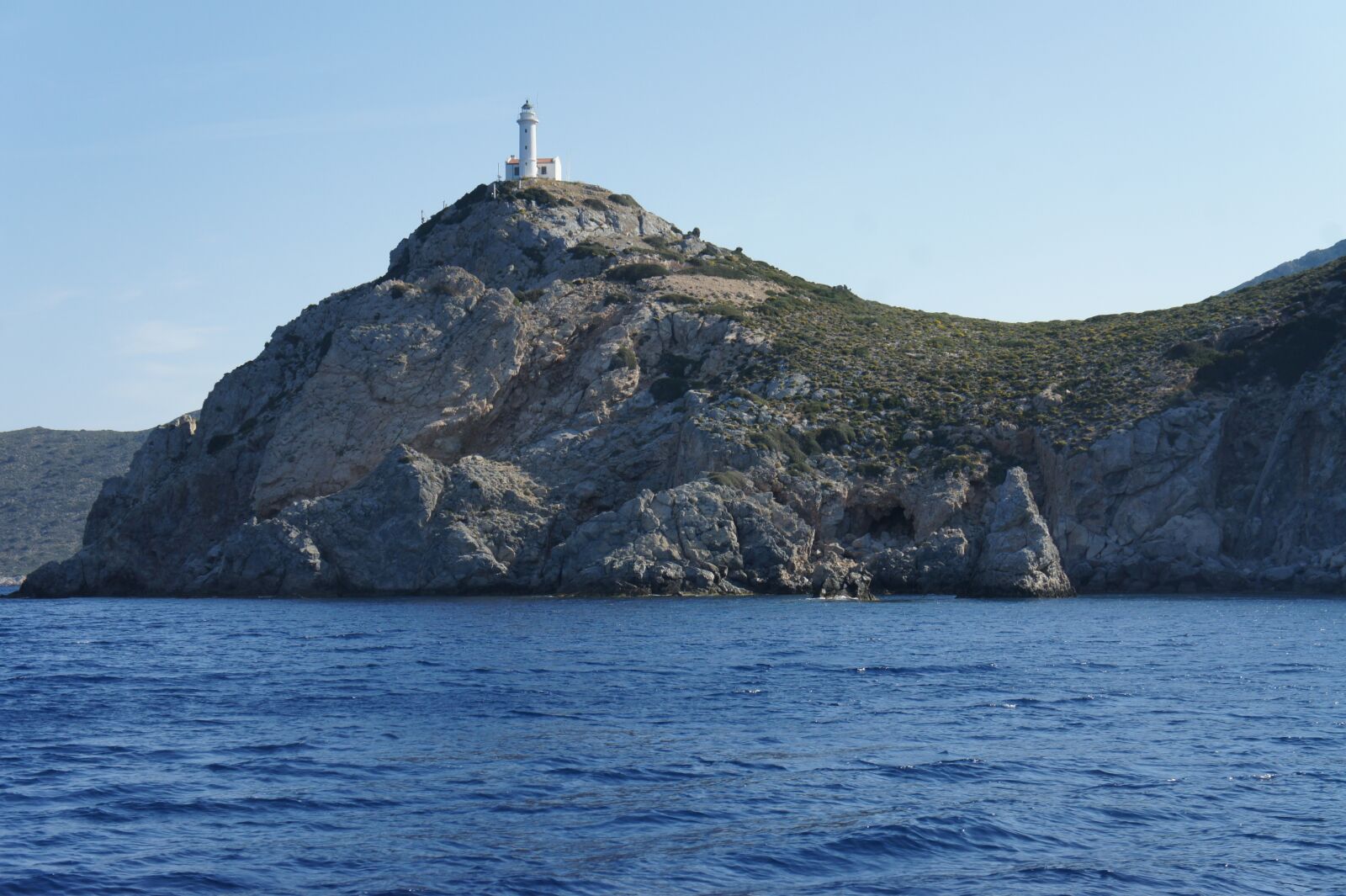 Sony Alpha NEX-5 sample photo. Lighthouse, sea, cliff photography