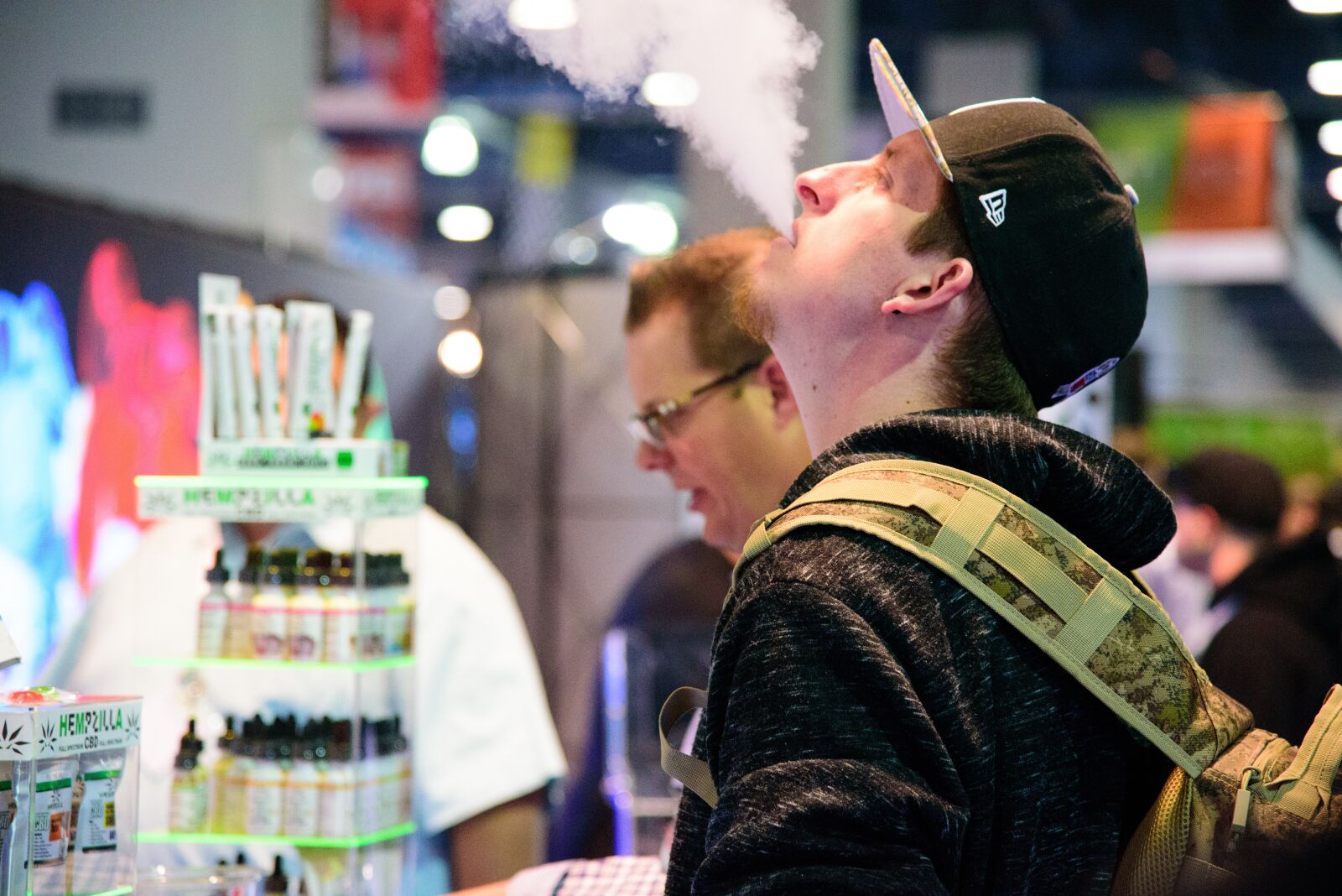 Nikon D750 sample photo. Gentleman blowing ecig vapor photography