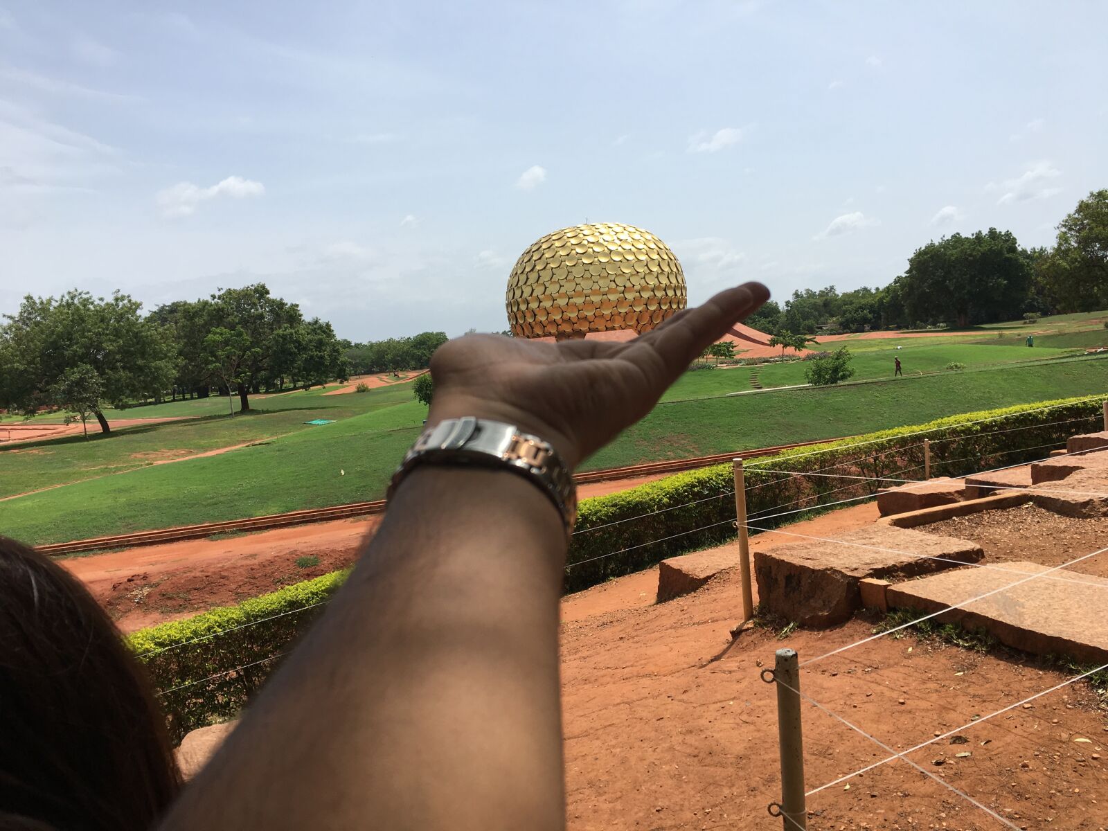 Apple iPhone 6s sample photo. Hand, ashram, golden sphere photography