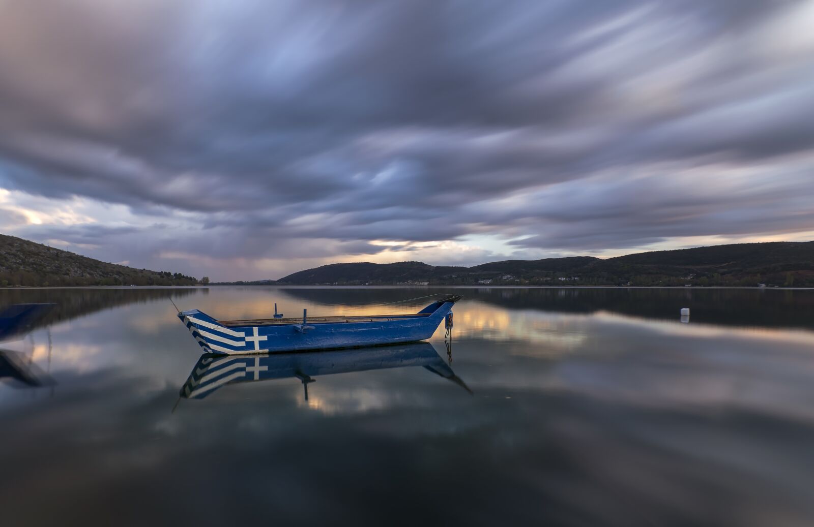 Tokina AT-X Pro 11-16mm F2.8 DX II sample photo. Boat, lake, long exposure photography