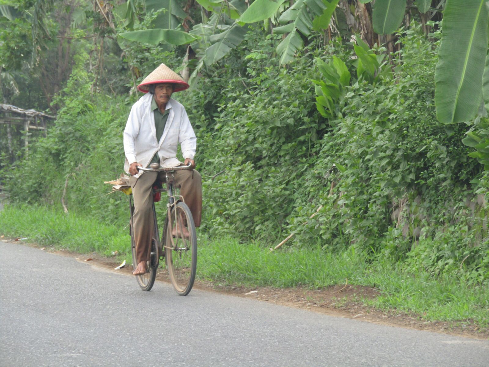 Canon POWERSHOT SX430 IS sample photo. Farmer, cycling, villager photography