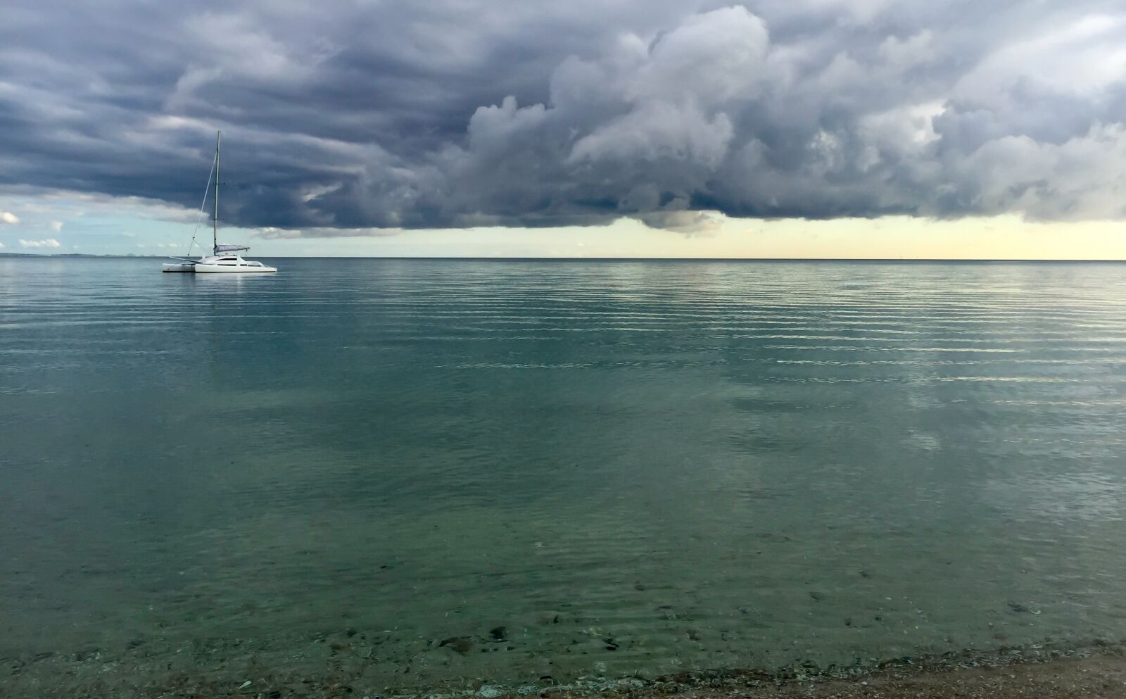 iPhone 6 back camera 4.15mm f/2.2 sample photo. Catamaran, yacht, bay photography