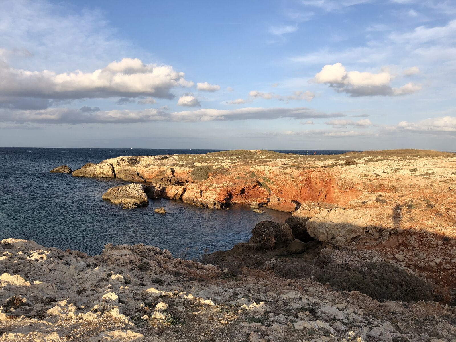iPhone 8 back camera 3.99mm f/1.8 sample photo. Puglia, evening sun, beach photography