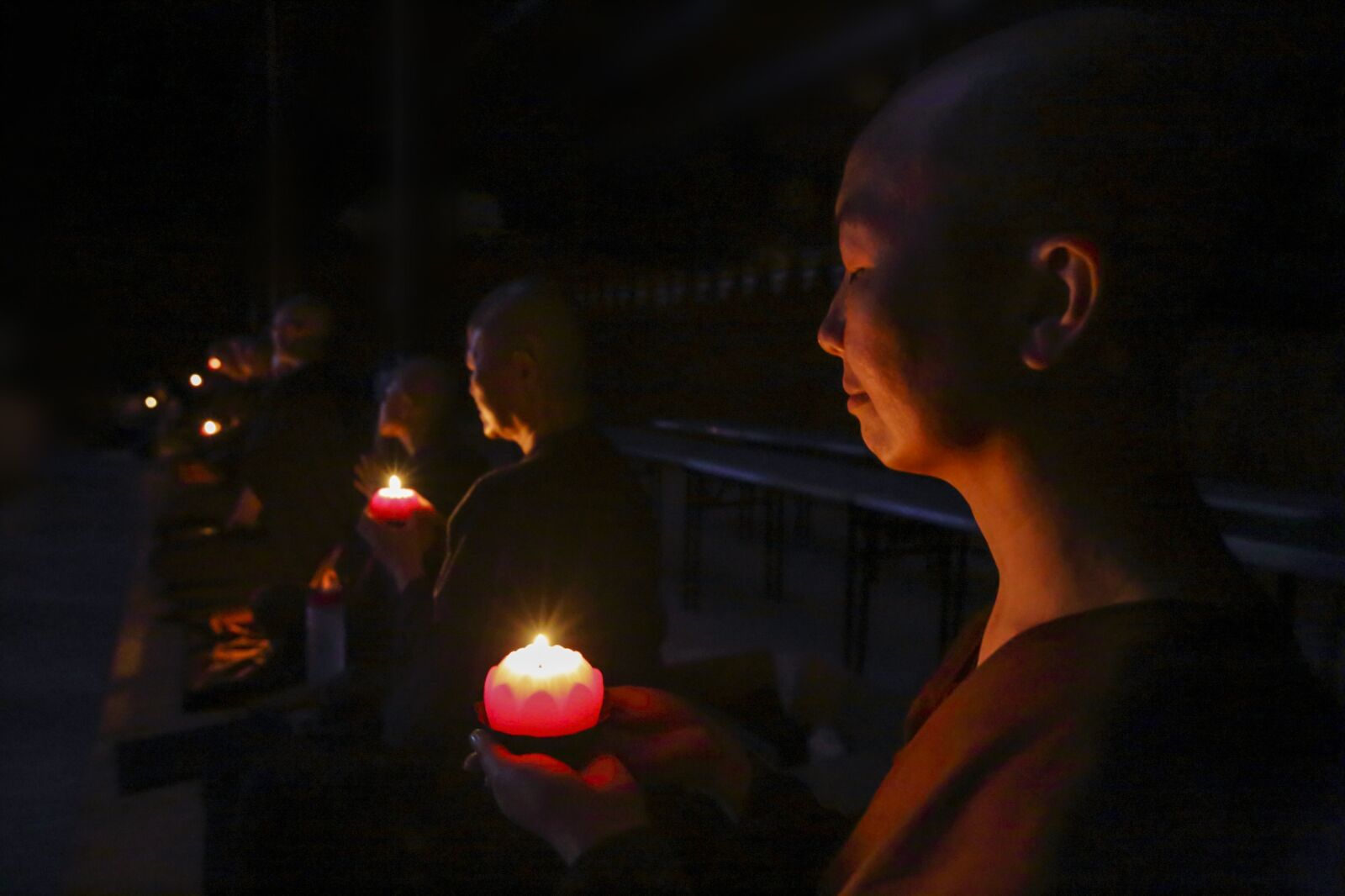 Canon EF 16-35mm F2.8L II USM sample photo. Nuns with candles, making photography