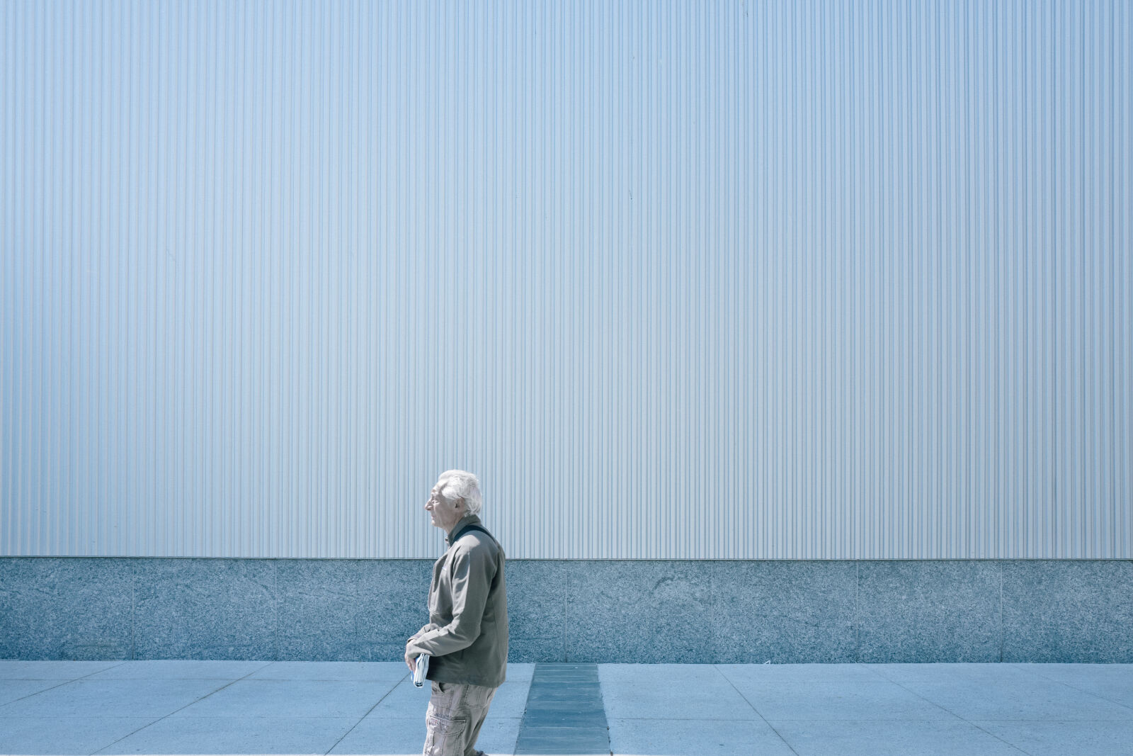 Leica Q (Typ 116) sample photo. Blue, oldman, walking, wall photography