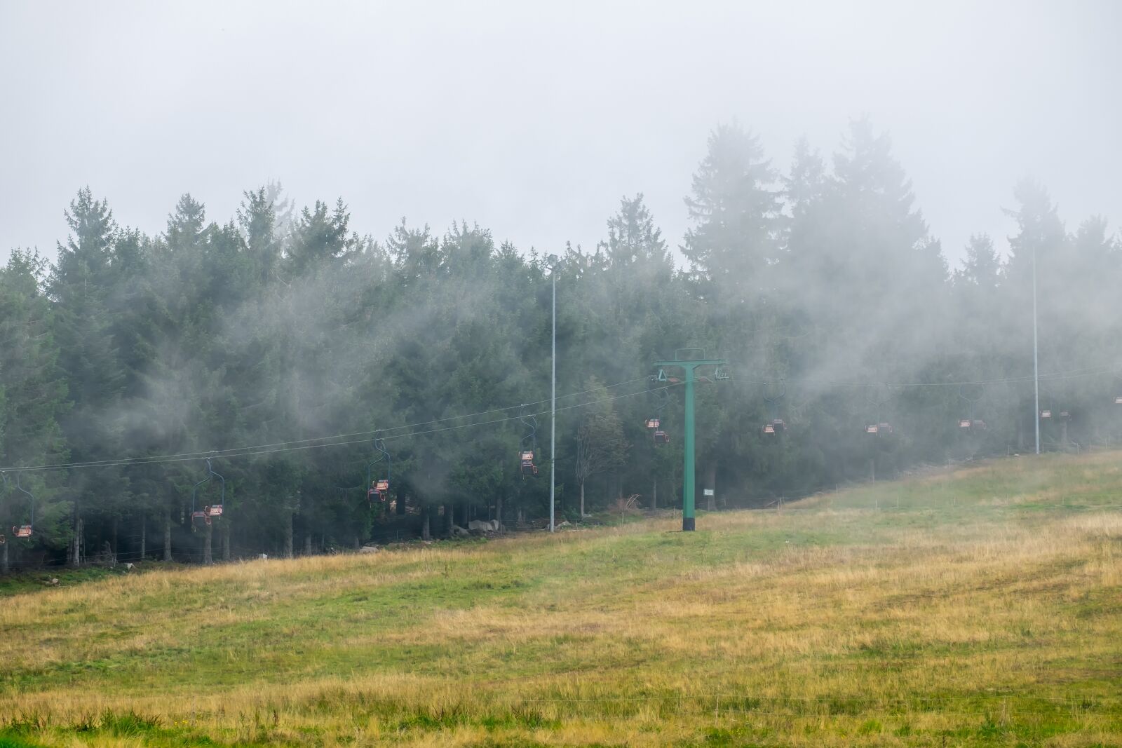 Fujifilm XF 55-200mm F3.5-4.8 R LM OIS sample photo. Fog, ski lift, chairlift photography