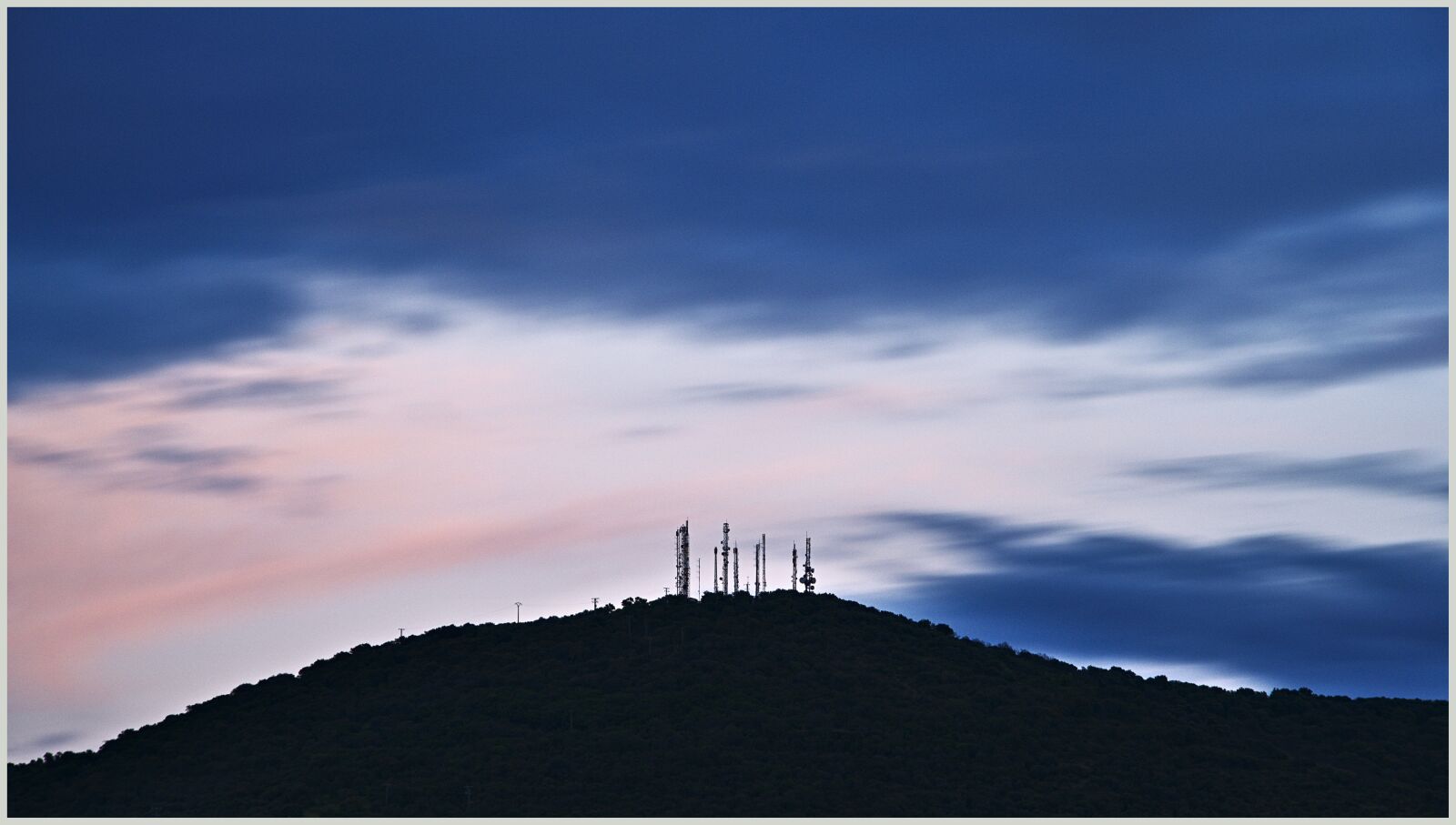 Sony a7R II + Sony FE 24-240mm F3.5-6.3 OSS sample photo. Antennas, sunset, clouds photography
