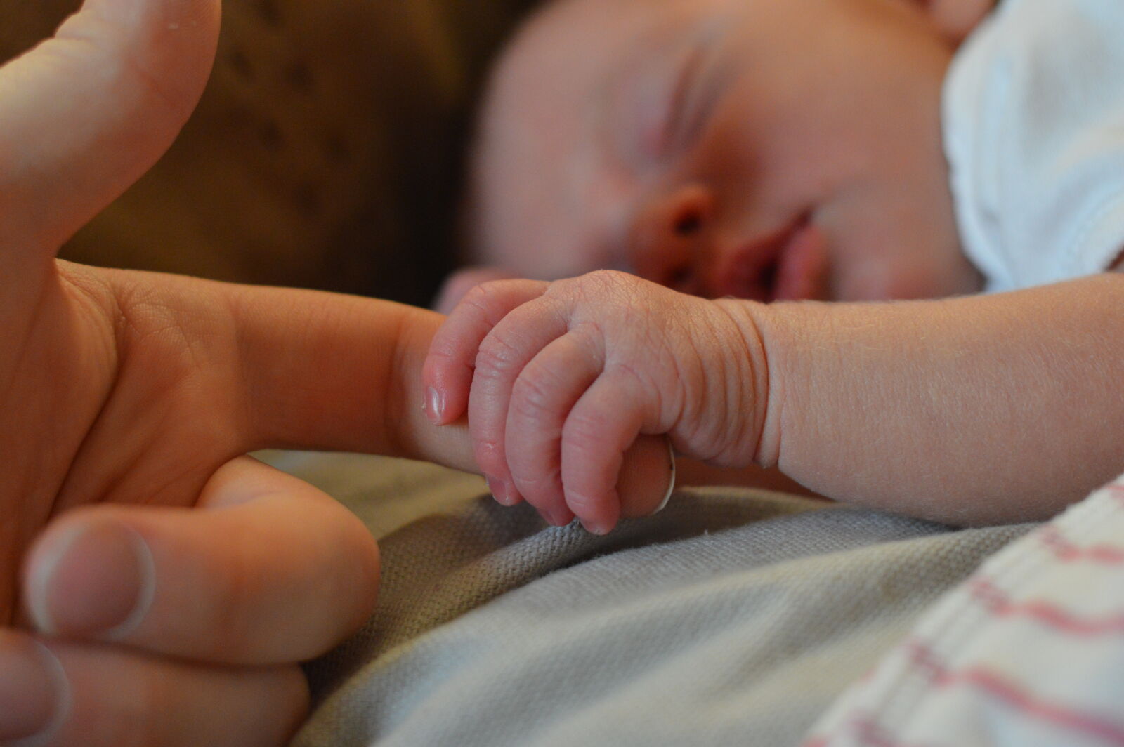 Nikon D3200 + Nikon AF-S Nikkor 50mm F1.8G sample photo. Baby, holding, human, finger photography