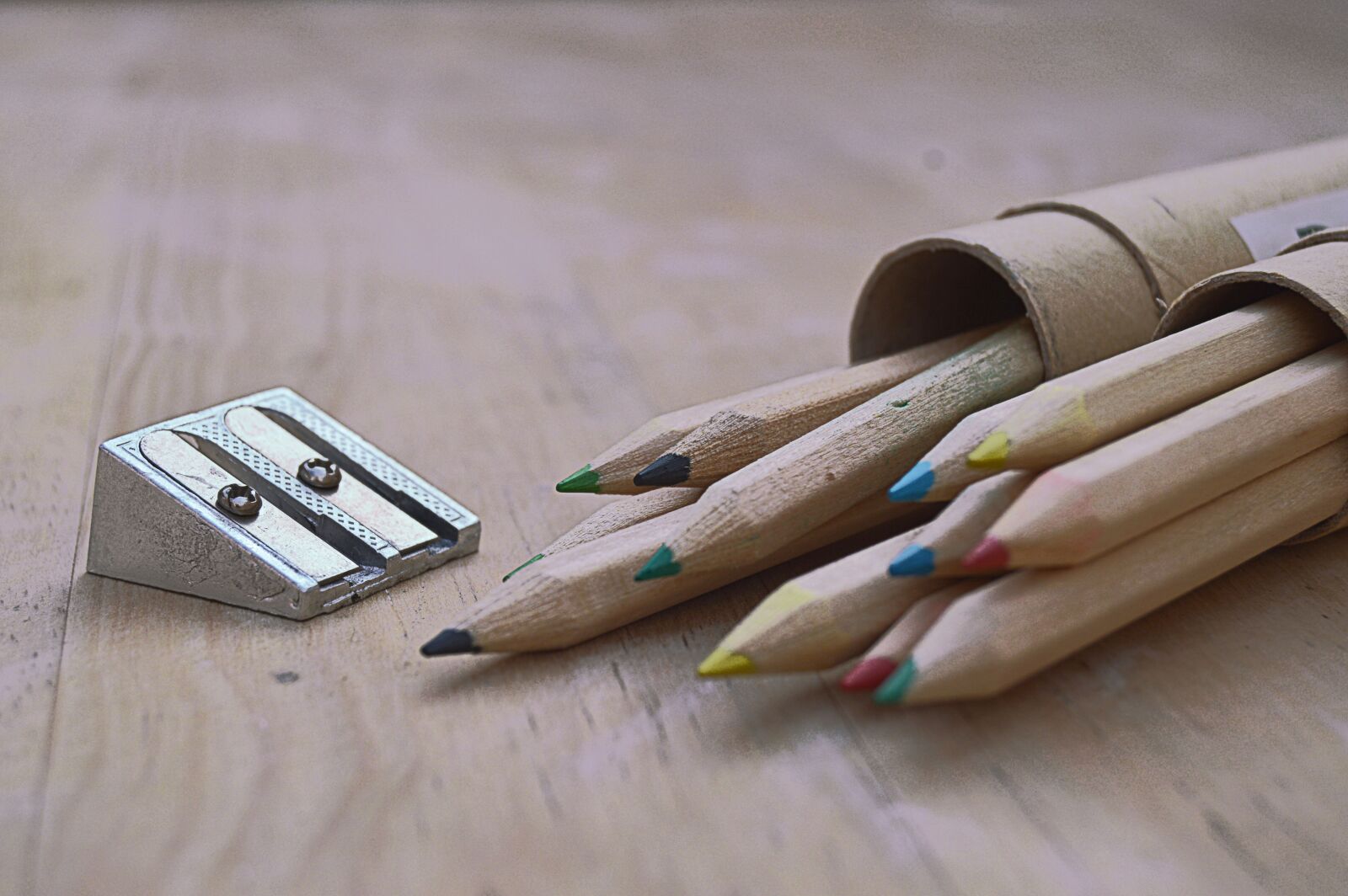 Nikon D3200 sample photo. Colored pencils, pencil sharpener photography
