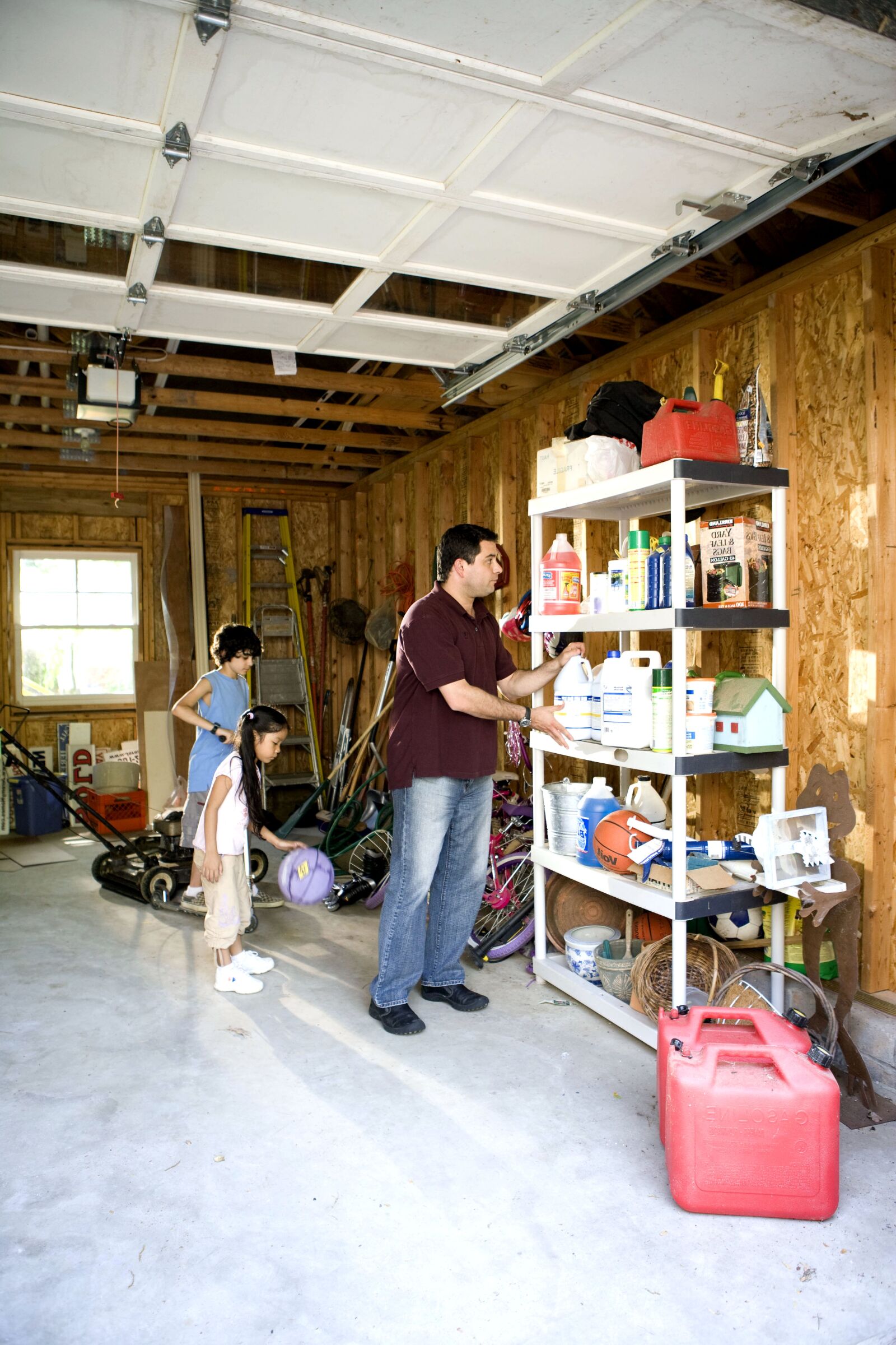 Canon EOS-1Ds Mark II sample photo. Father, organizing, garage, children photography