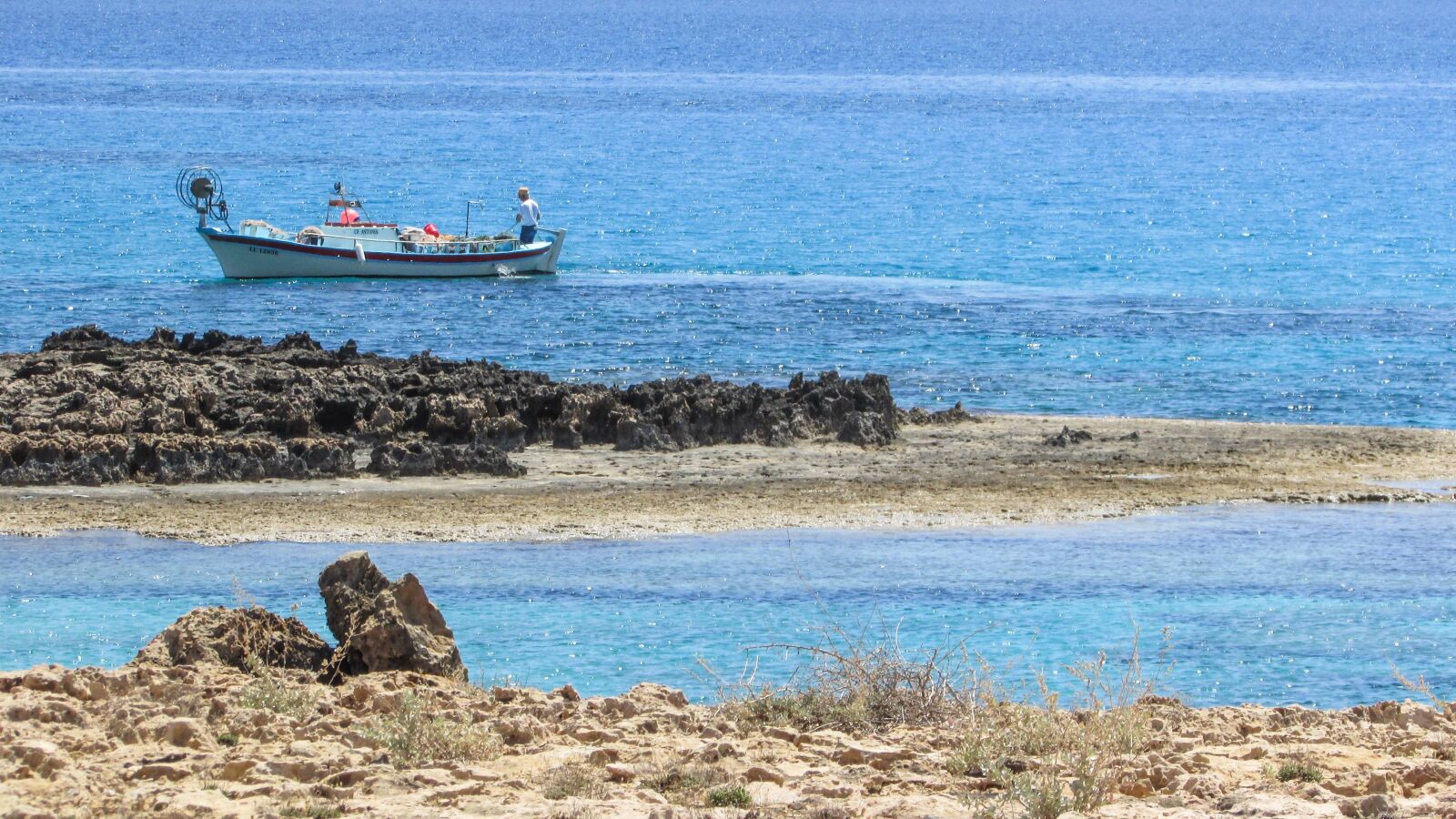 Canon PowerShot SX400 IS sample photo. Cyprus, rocky cost, blue photography