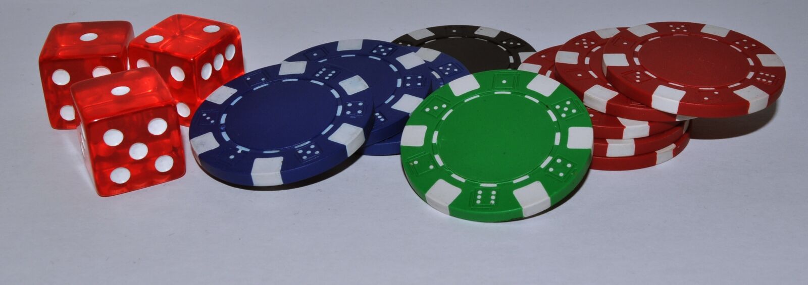 Nikon D5000 sample photo. Chips, cube, gambling photography
