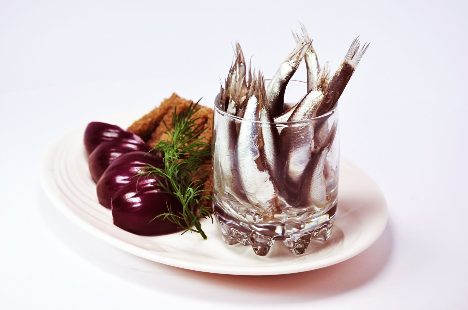 Nikon D5000 sample photo. Fish, onion, bread photography