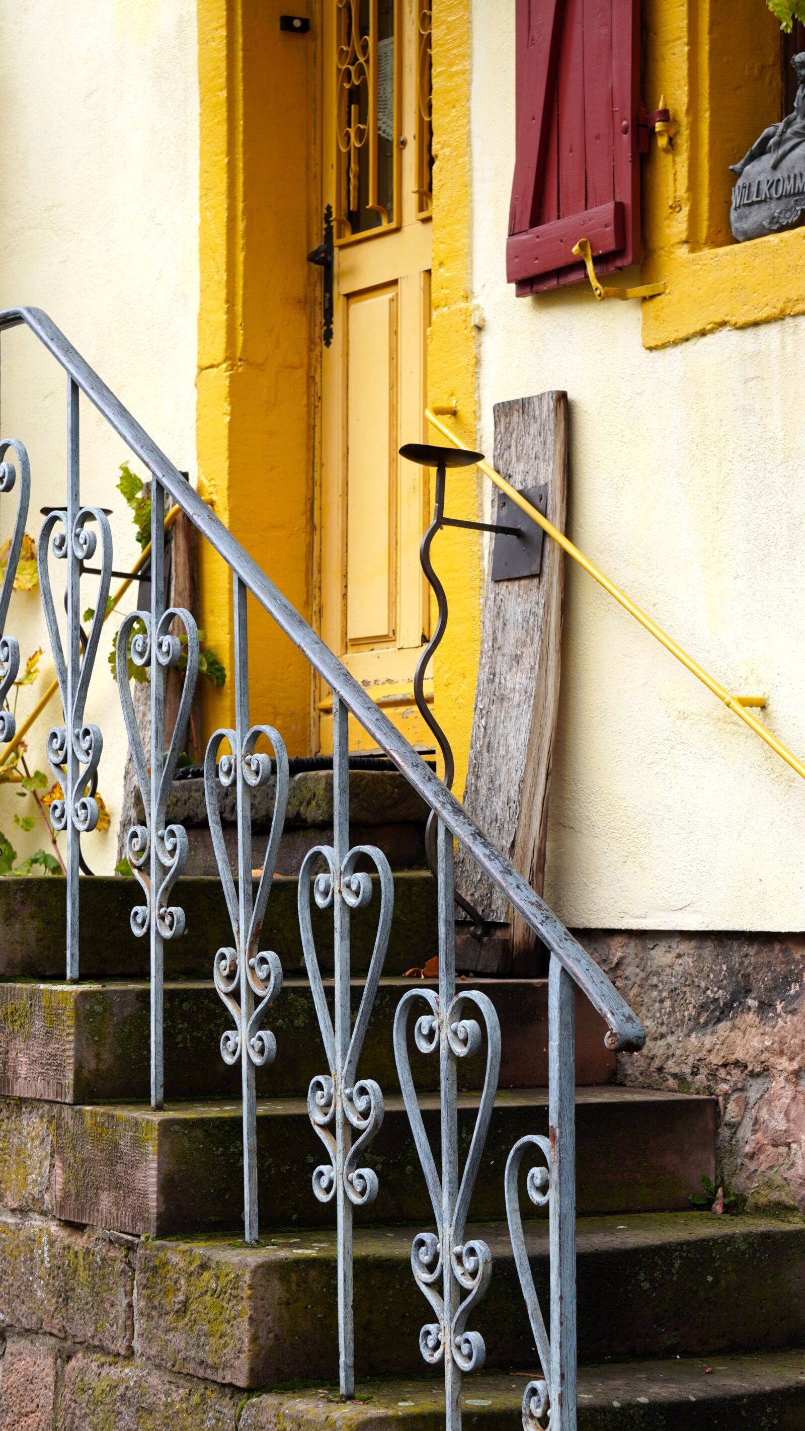 Sony E 55-210mm F4.5-6.3 OSS sample photo. Stairs, door, old photography