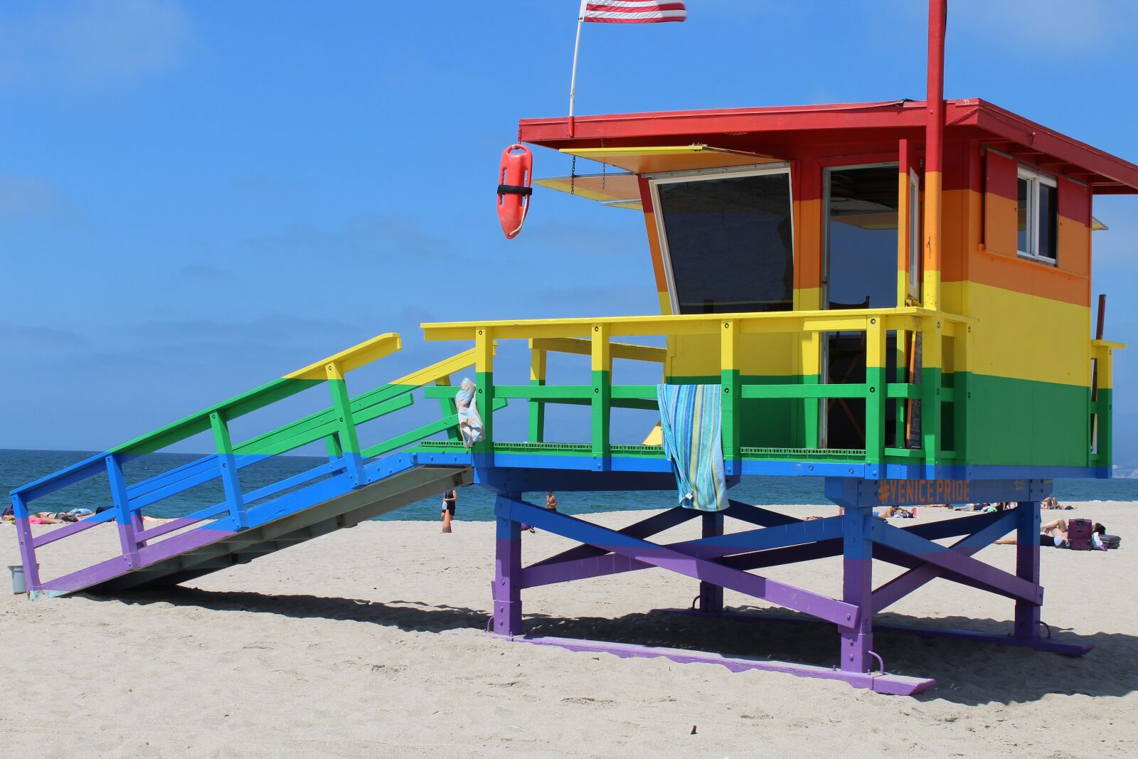 Canon EOS 1300D (EOS Rebel T6 / EOS Kiss X80) sample photo. Beach, lifeguard, rainbow photography