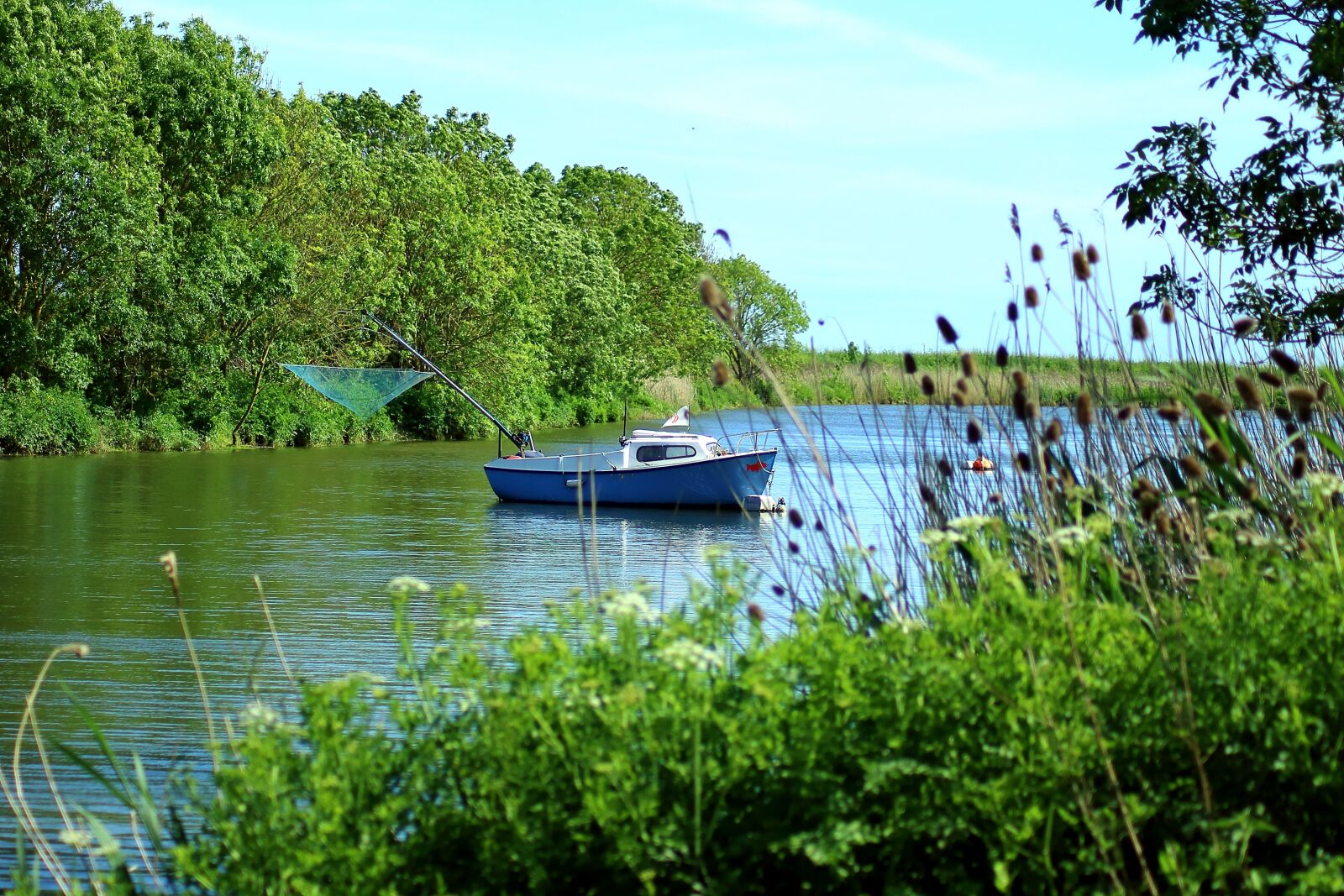 Canon EOS 1200D (EOS Rebel T5 / EOS Kiss X70 / EOS Hi) sample photo. River boat, calm, water photography
