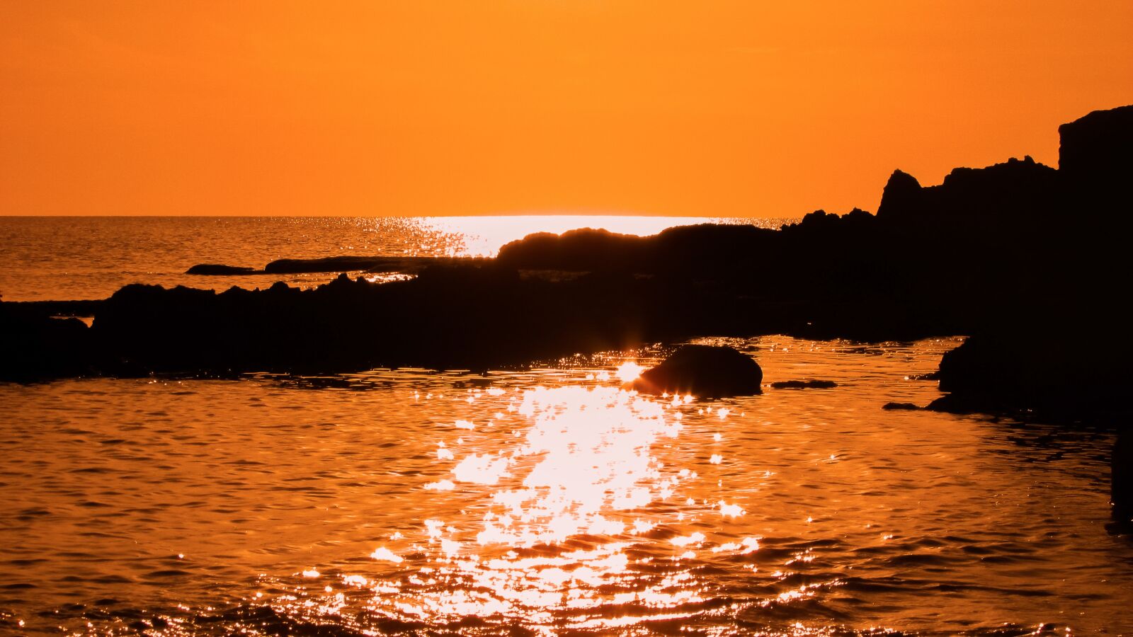 Canon PowerShot SX400 IS sample photo. Rocky coast, sunset, sea photography