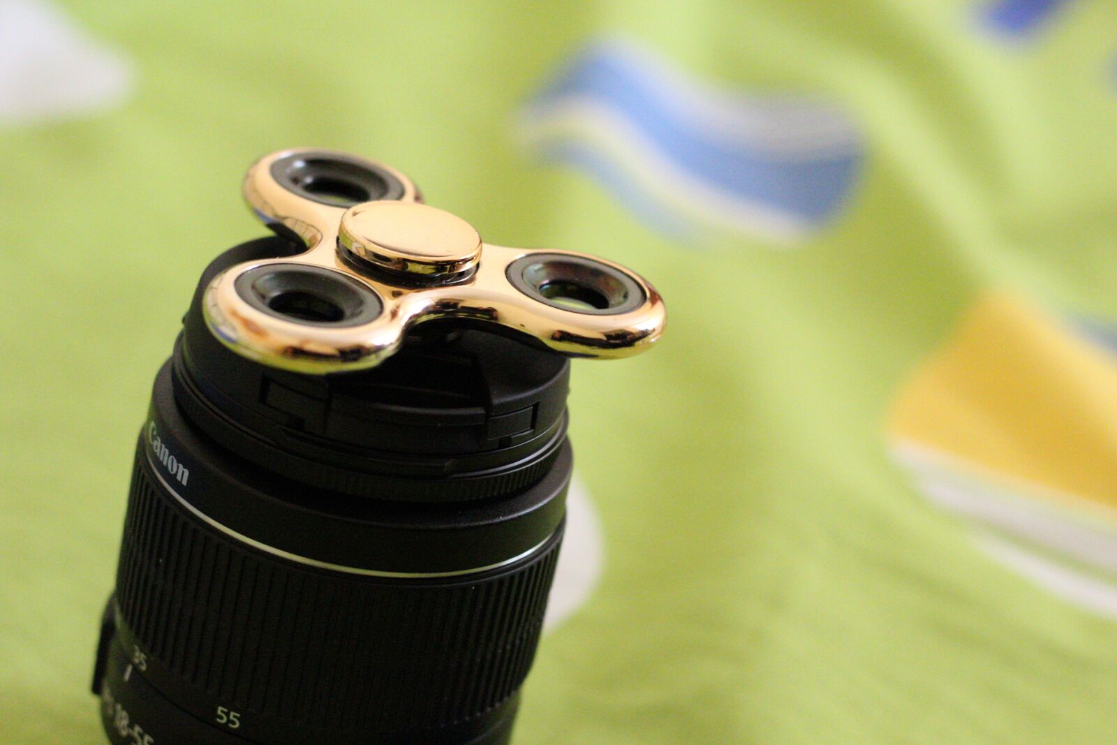Canon EOS 1300D (EOS Rebel T6 / EOS Kiss X80) sample photo. Spinner, gold, games photography