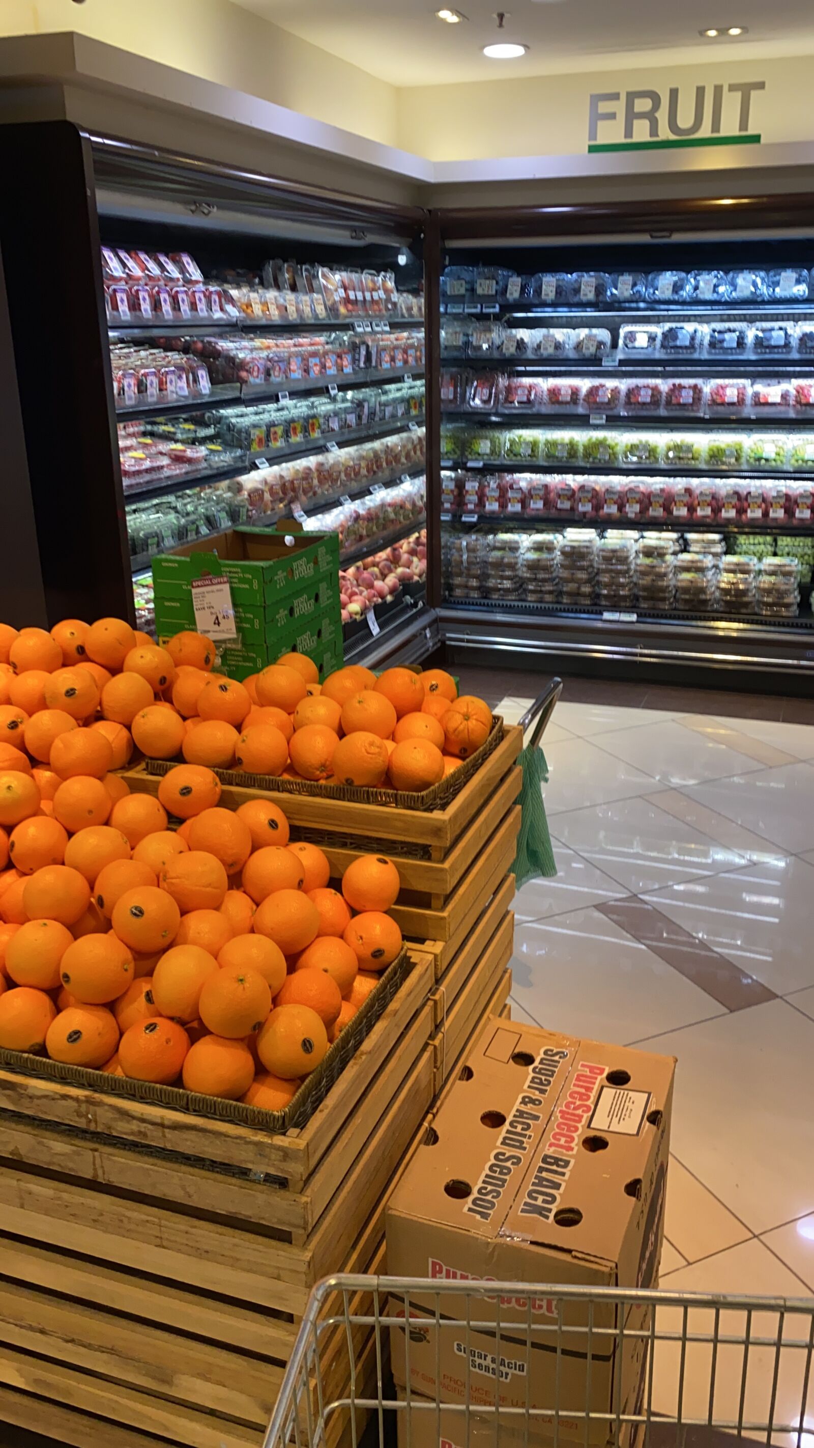 Apple iPhone 11 sample photo. Supermarket, oranges, groceries photography