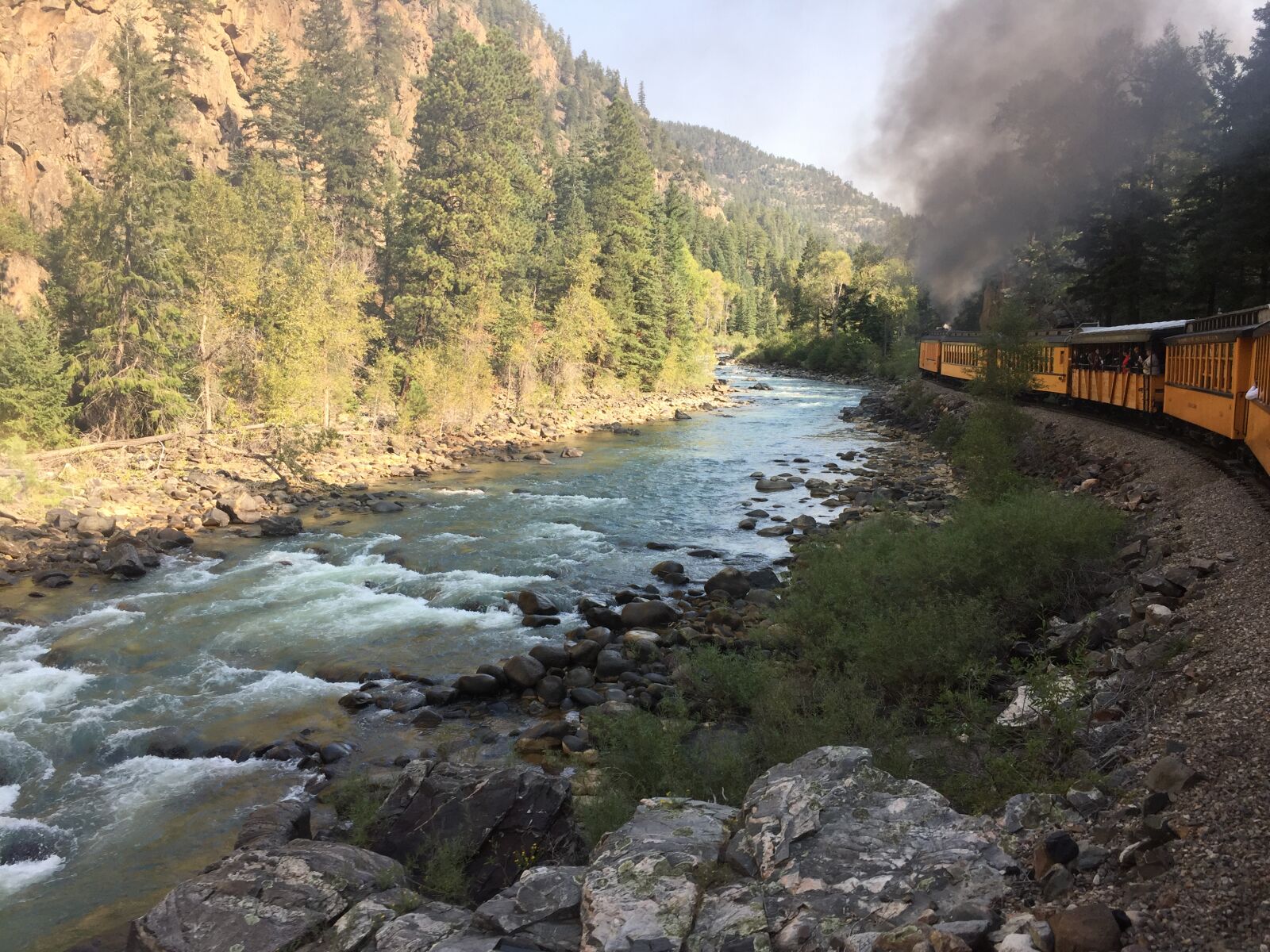 iPhone 6 back camera 4.15mm f/2.2 sample photo. Mountains, river, train photography