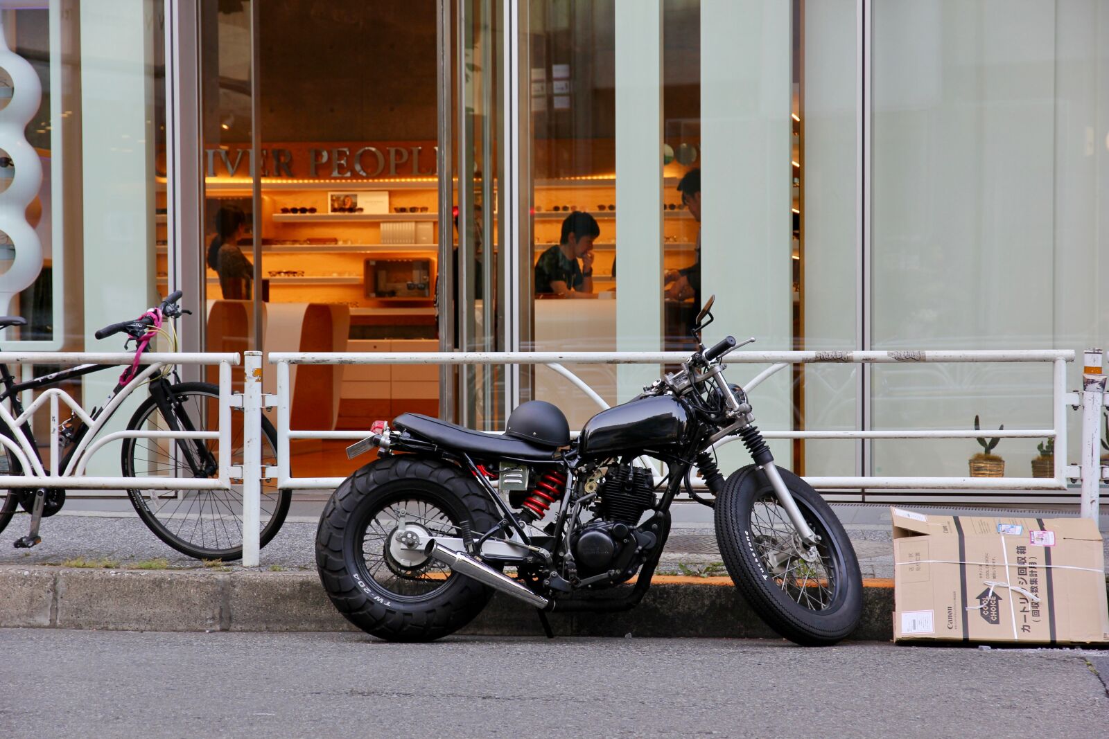 Canon EF-S 15-85mm F3.5-5.6 IS USM sample photo. Motorcycle, road, urban photography