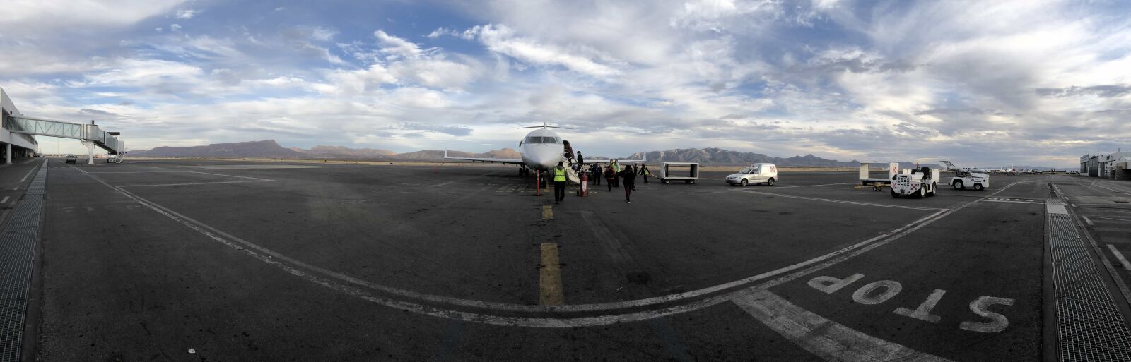 iPhone X back camera 4mm f/1.8 sample photo. Boarding, runway, airplane, airport photography