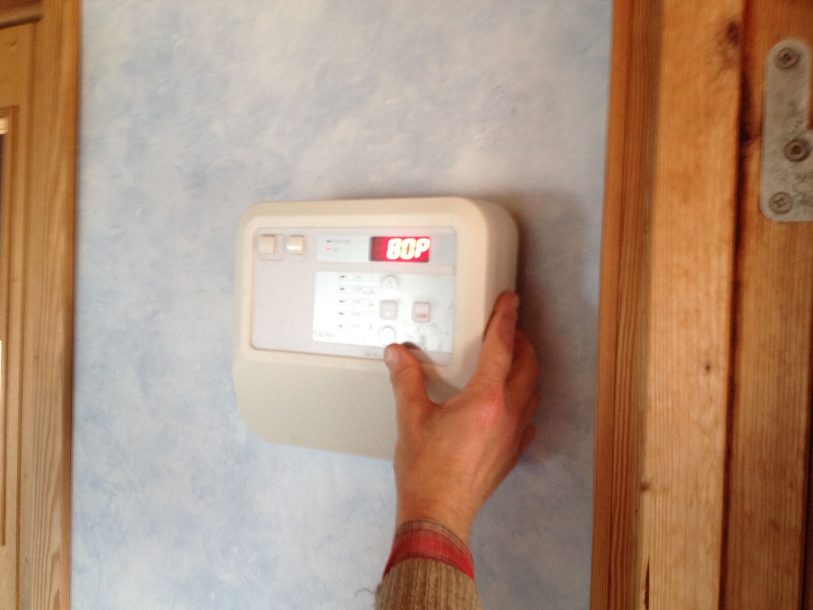 iPhone 4S back camera 4.28mm f/2.4 sample photo. Controller, sauna, wall photography
