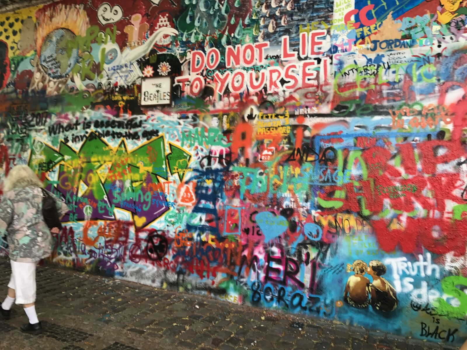 iPhone 7 back camera 3.99mm f/1.8 sample photo. Graffitti, john lennon wall photography