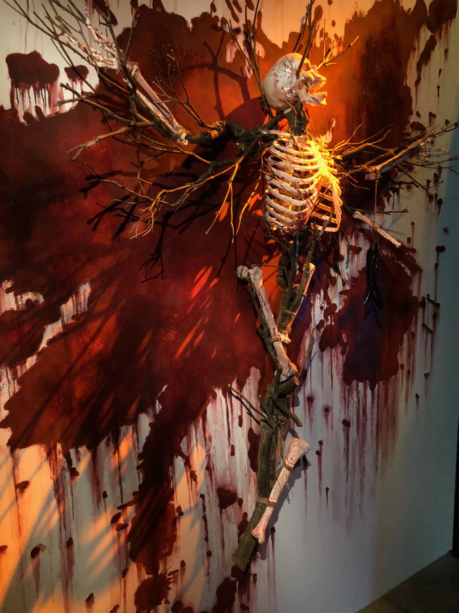 iPhone X back dual camera 4mm f/1.8 sample photo. Skeleton, blood, blood spatter photography