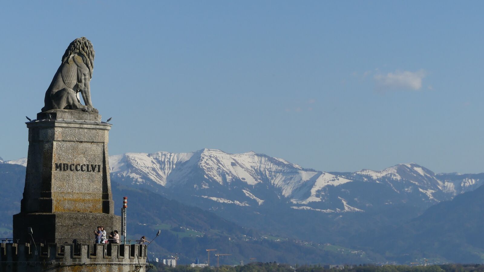 Panasonic Lumix DMC-FZ300 sample photo. Mountain, snow, statue photography