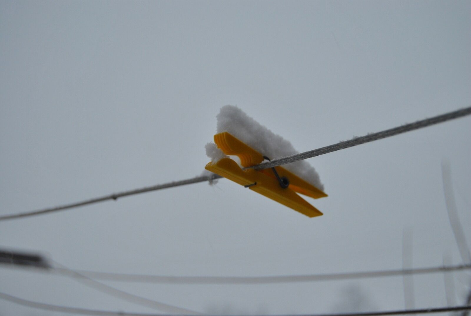 Nikon D3000 sample photo. Clothespin, hang, snow photography