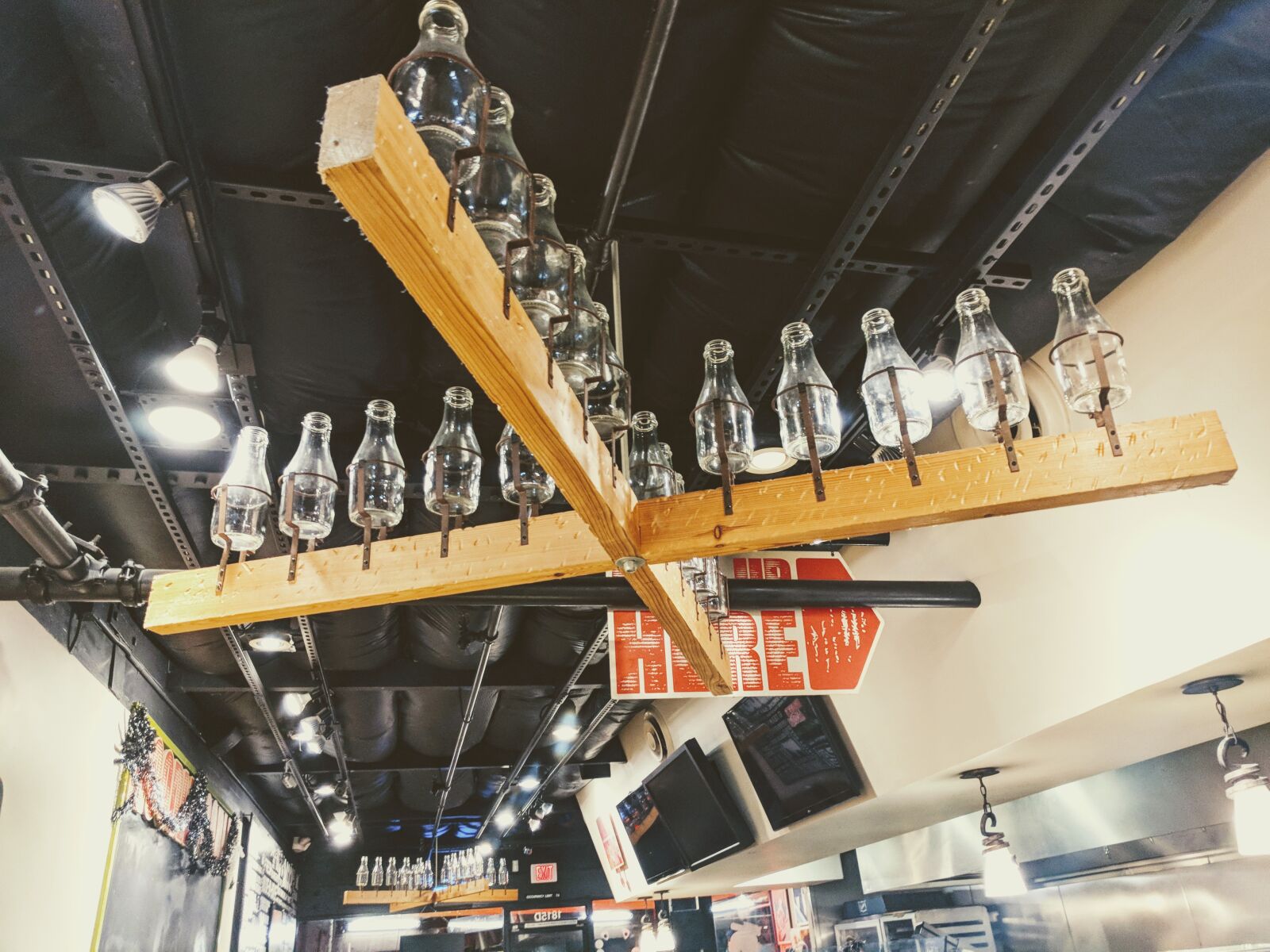 Google Pixel XL sample photo. Bottles, chandelier, restaurant photography