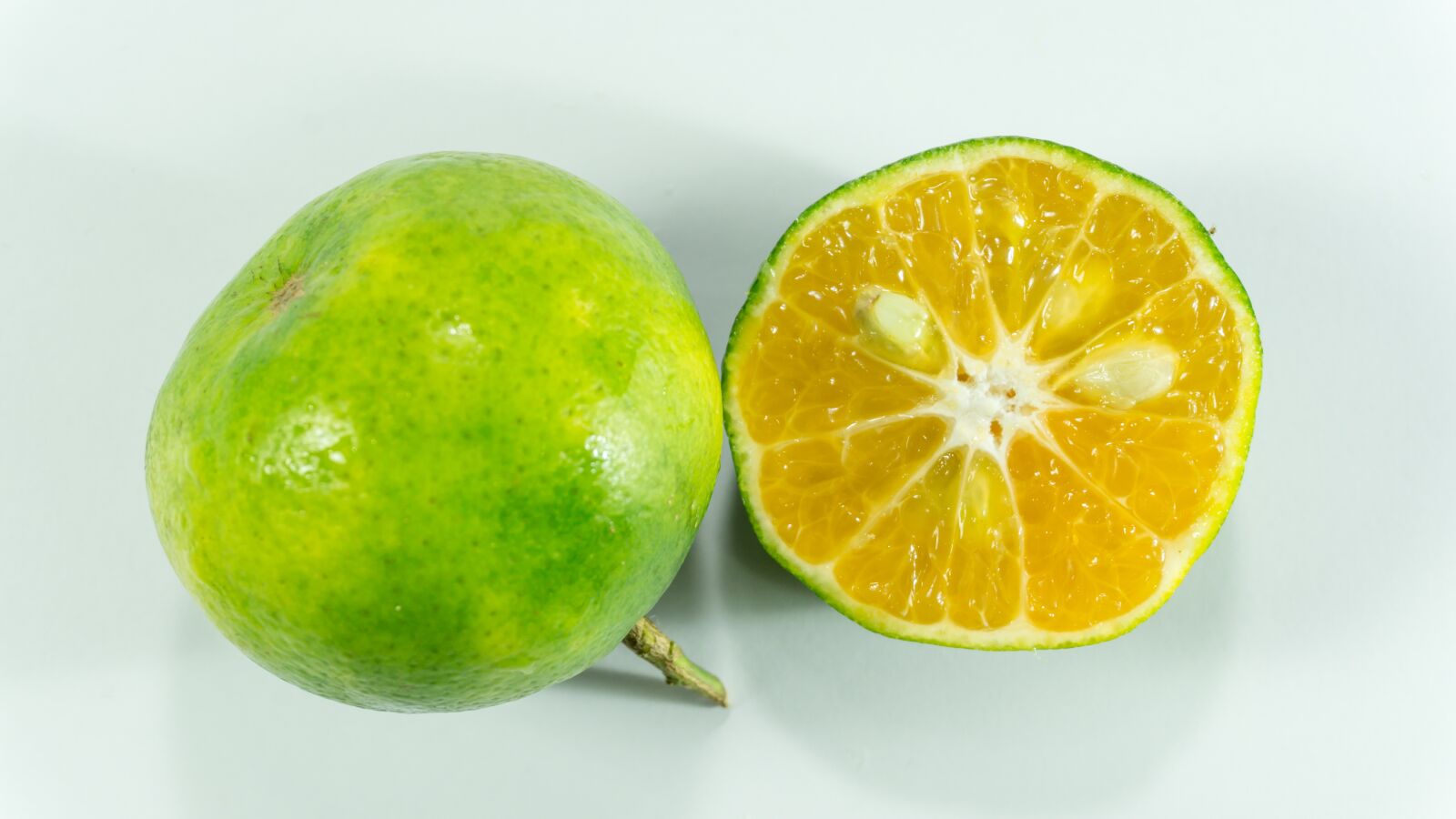 Sony a5100 sample photo. Asian green oranges, vitamin photography