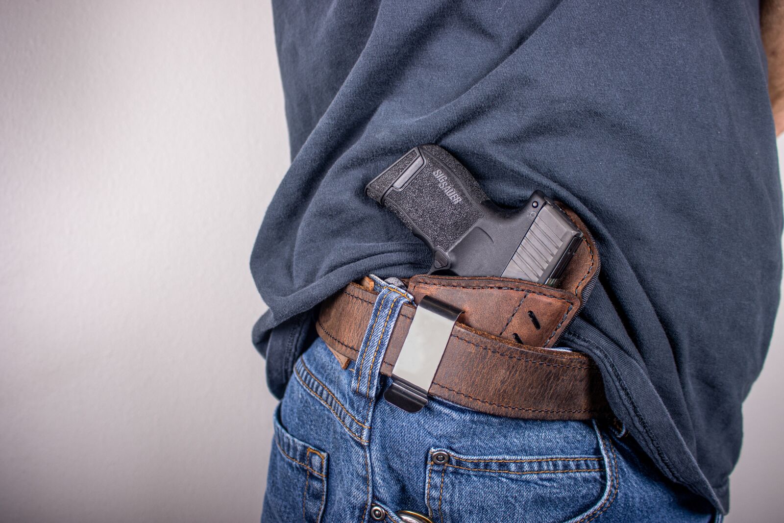 Canon EOS 90D sample photo. Gun belt, carry holster photography
