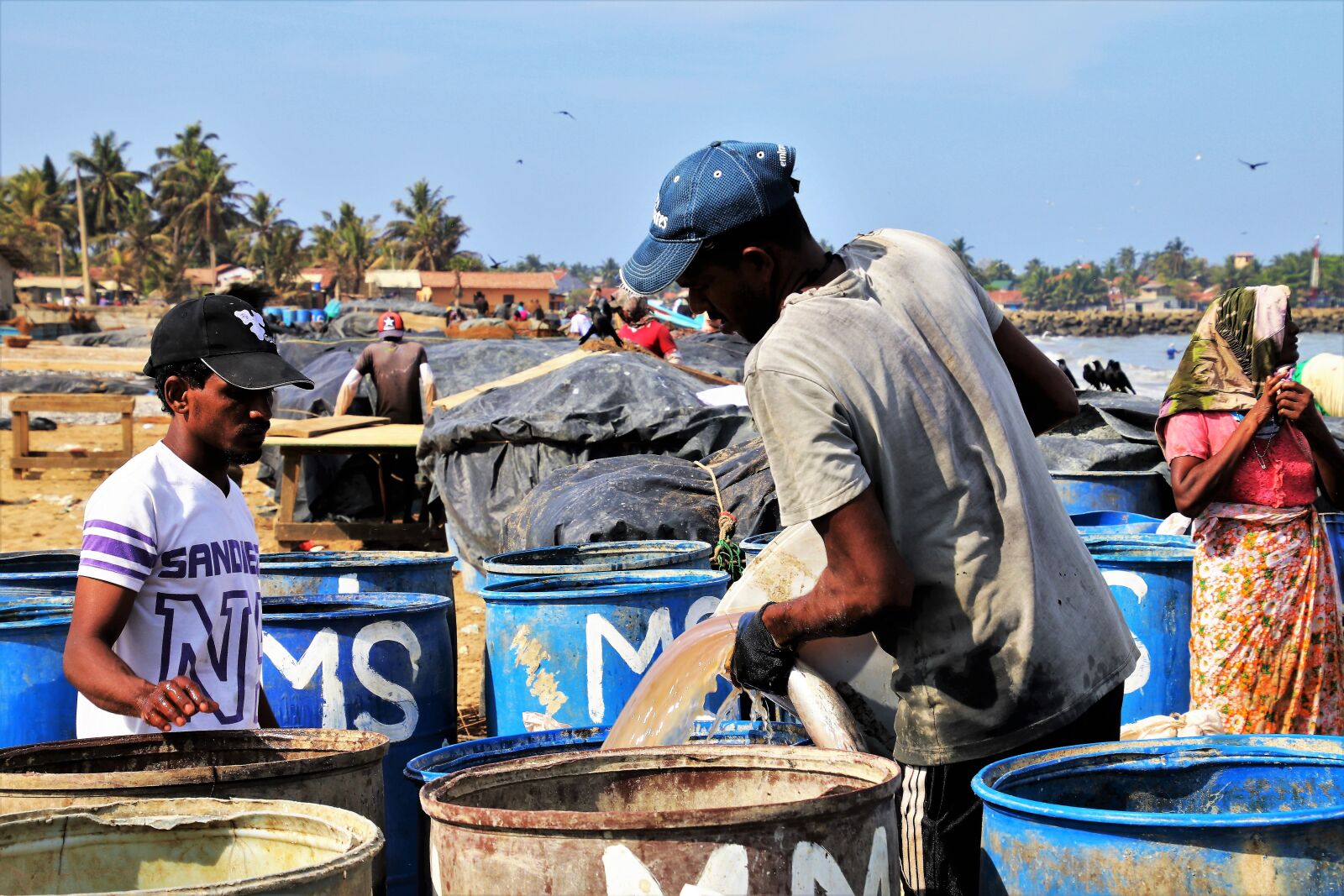 Canon EOS 80D sample photo. The fishermen, two, barrel photography