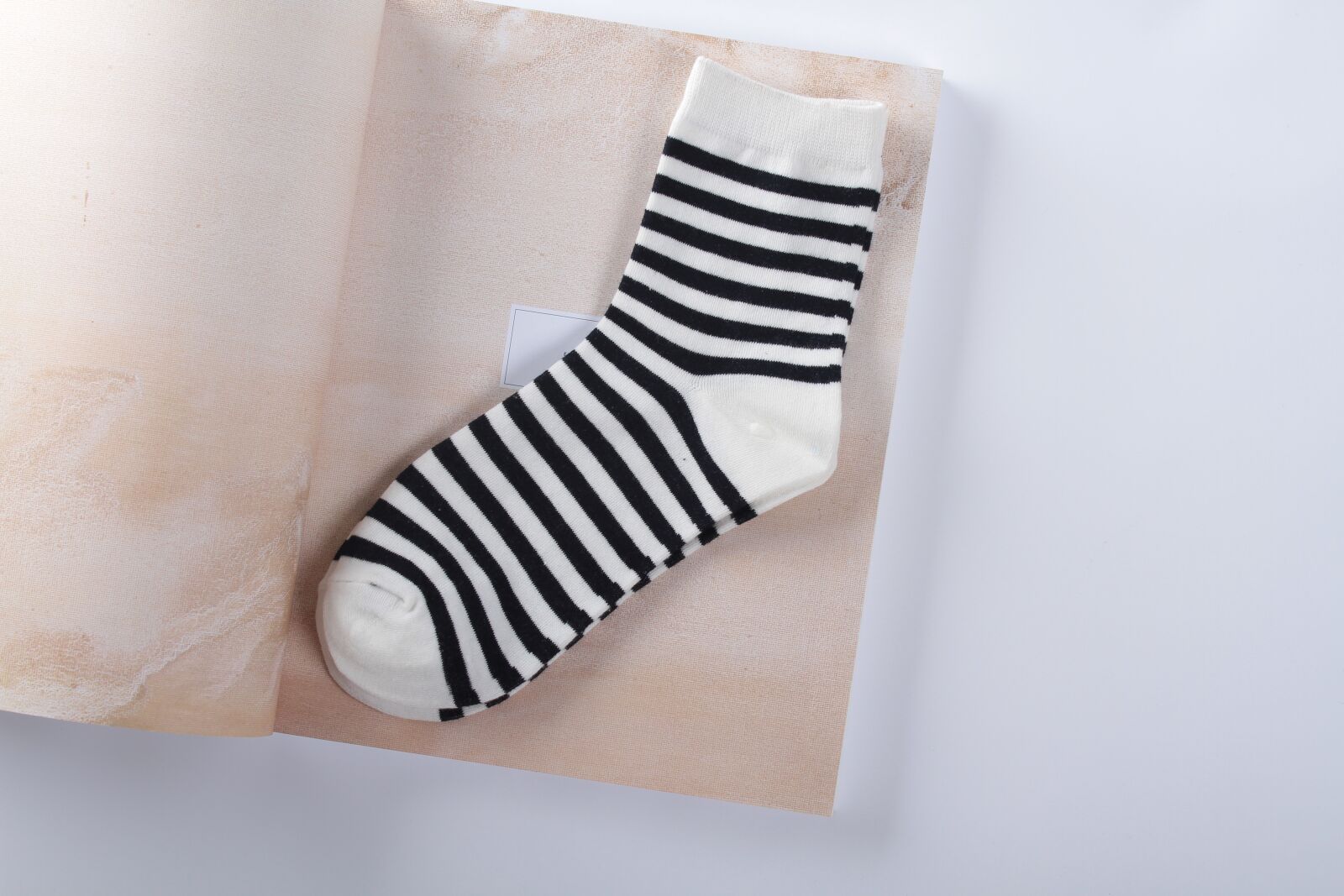 Canon EOS 7D + Canon EF-S 18-55mm F3.5-5.6 IS II sample photo. Sock, black, stripes photography