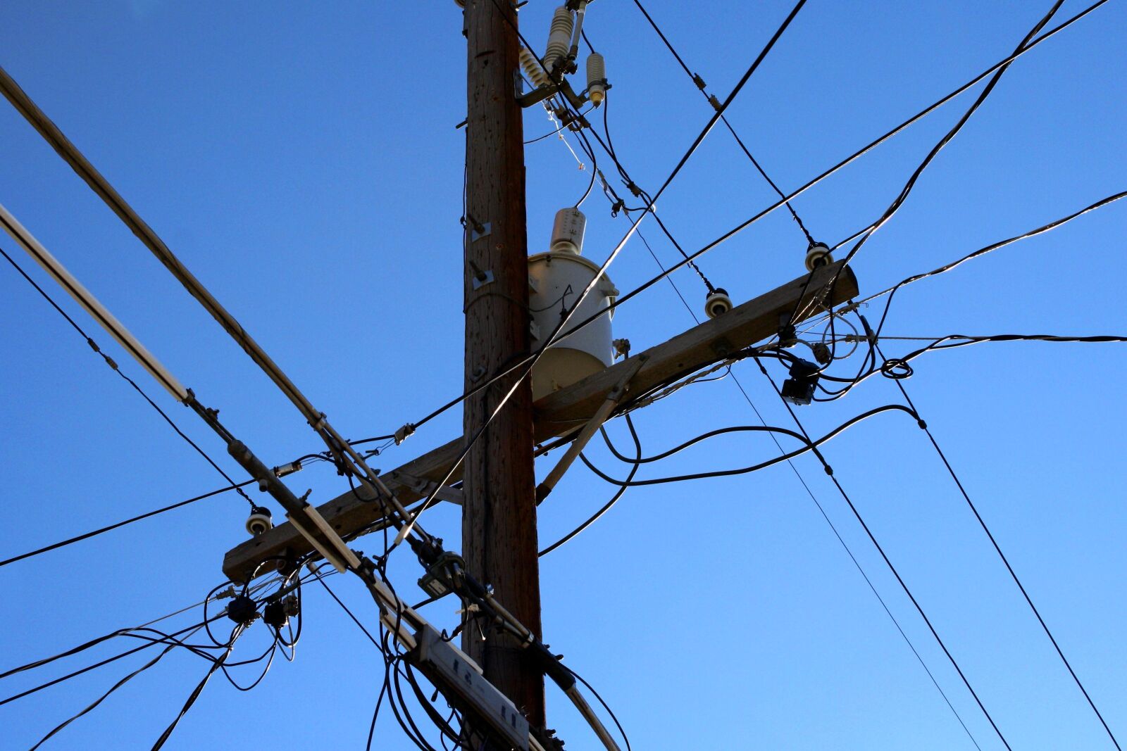 f/3.5-5.6 IS sample photo. Telephone pole, phone wires photography